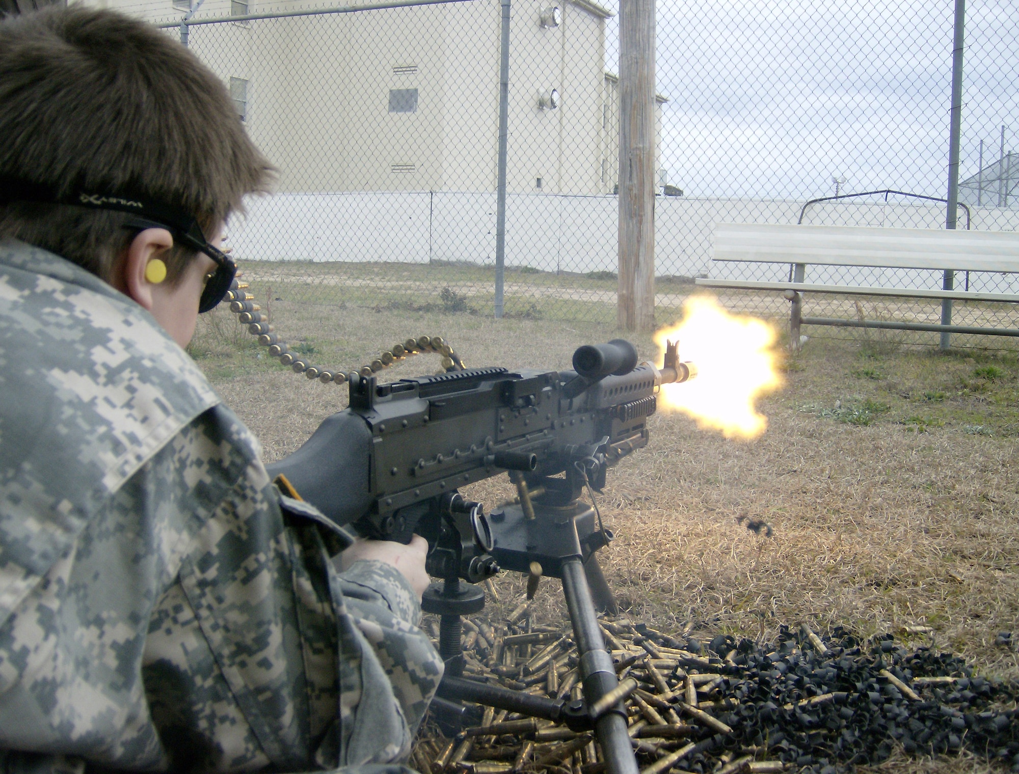 CAMP RUDDER, Fla. -- Riley Woina, 14, from Connecticut, fires a M-249 at the 6th Ranger Training Battalion here Feb. 20. Riley, diagnosed with cystic fibrosis, was granted a week with the 6th Ranger Training Battalion and Eglin Airmen through the Make-A-Wish Foundation Feb. 19-24. (U.S Army photo by Army Capt. Jeremiah Cordovano)