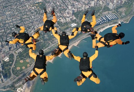 For more than 44 years the "Golden Knights" have been wowing audiences at air shows, competitions and most recently, with high profile tandems. During Luke Days 2007 crowds will witness their amazing talent. The U.S. Army parachute team performs more than 27,000 jumps before an estimated 12 million people annually. (Courtesy photo)
