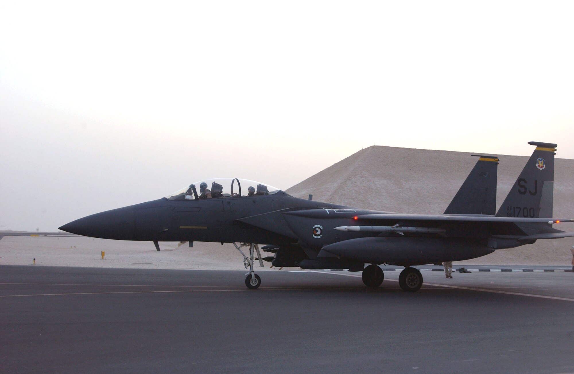 F-15E Strike Eagles, similar to this one taxiing from its protective bunker for a night combat mission over Iraq, play a critical role in providing close-air support to ground forces in contact with anti-Iraqi forces as part of Operation Iraqi Freedom.  (U.S. Air Force photo/Master Sgt. John DeGroot)