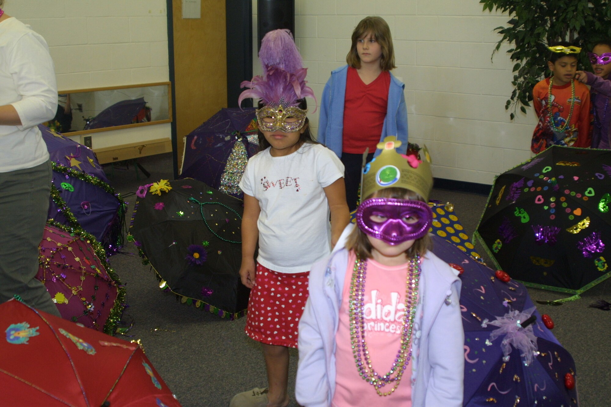 Students at Pope Elementary School celebrated Fat Tuesday Feb. 13, by hosting a "Strutter's Ball." Thirty-one students decorated umbrellas and competed for awards such as "Most Colorful" and "Most Froo Froo." The Parent and Teacher Organization has raised $647 for a New Orleans elementary school and sold baked goods at the celebration to add to that amount.
