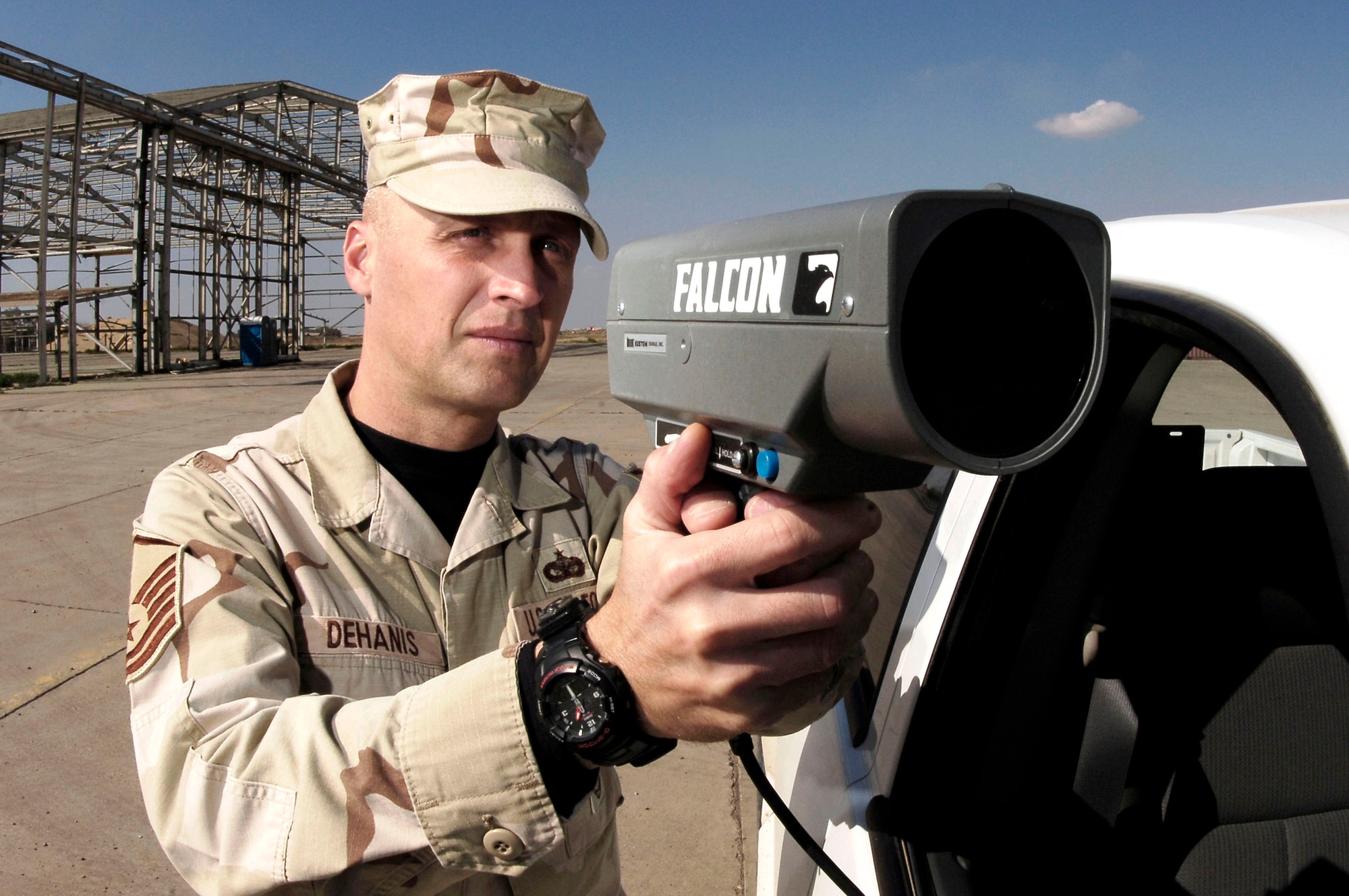Master Sgt. John Dehanis operates a radar gun Feb. 19 at Kirkuk Air Base, Iraq. Sergeant Dehanis ensures that no one is dangerously speeding on the installation. He is a member of the 506th Expeditionary Security Forces Squadron. (U.S. Air Force photo/Senior Airman Bradley Lail)