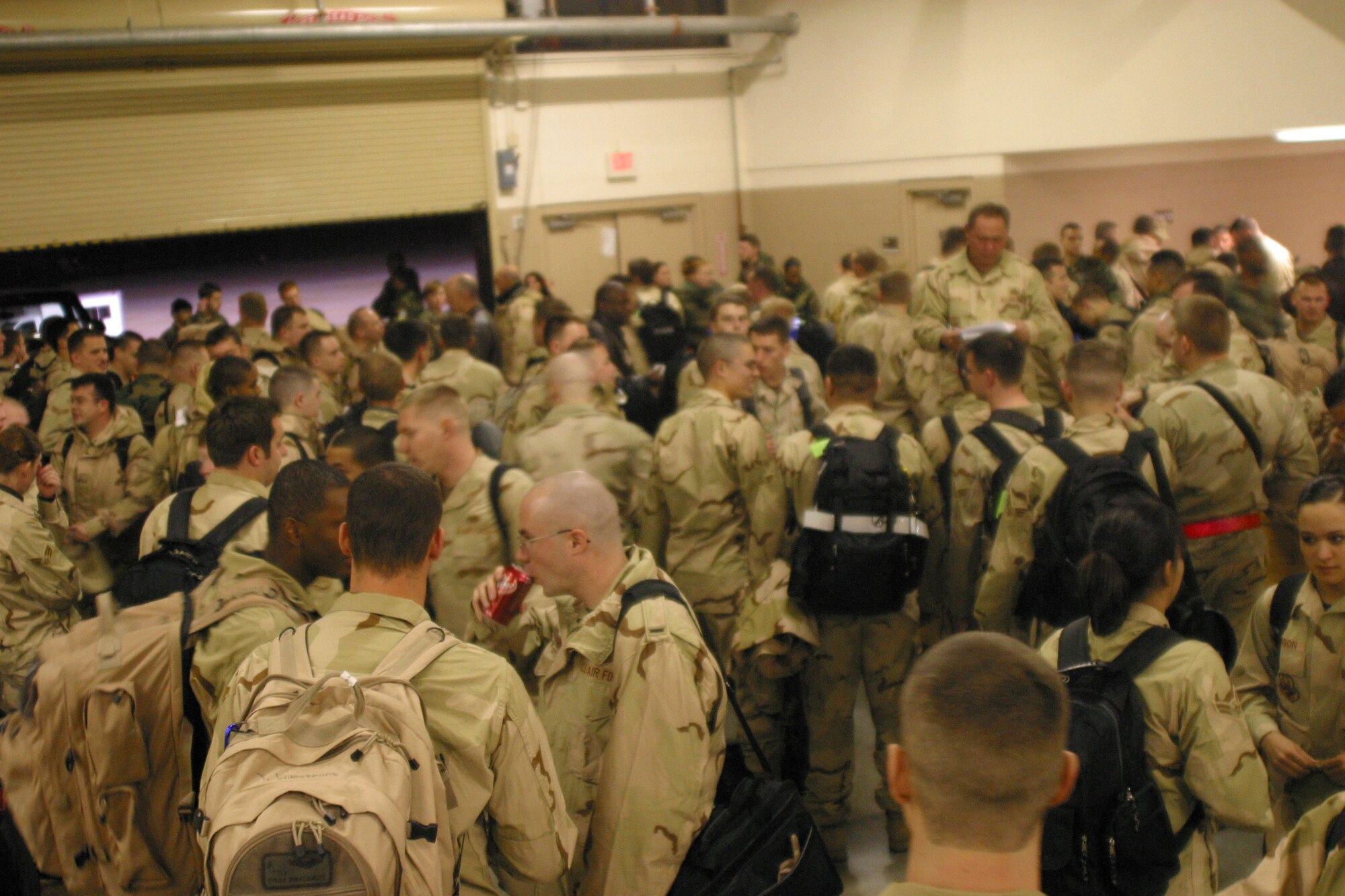 More than 200 Team Pope Airmen deployed in support of the Global War on Terrorism out of Hangar 1 Monday.