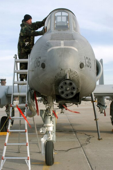 Tech. Sgt. Pete Melby, an Air Force Reserve crew chief with the 442nd Fighter Wing, polishes the canopy on an A-10 Thunderbolt II Feb. 11 at Whiteman Air Force Base, MO.  The 442nd Fighter Wing operates a full squadron of A-10s with support from three groups, a medical squadron and a wing staff. (U.S. Air Force photo/Maj. David Kurle)