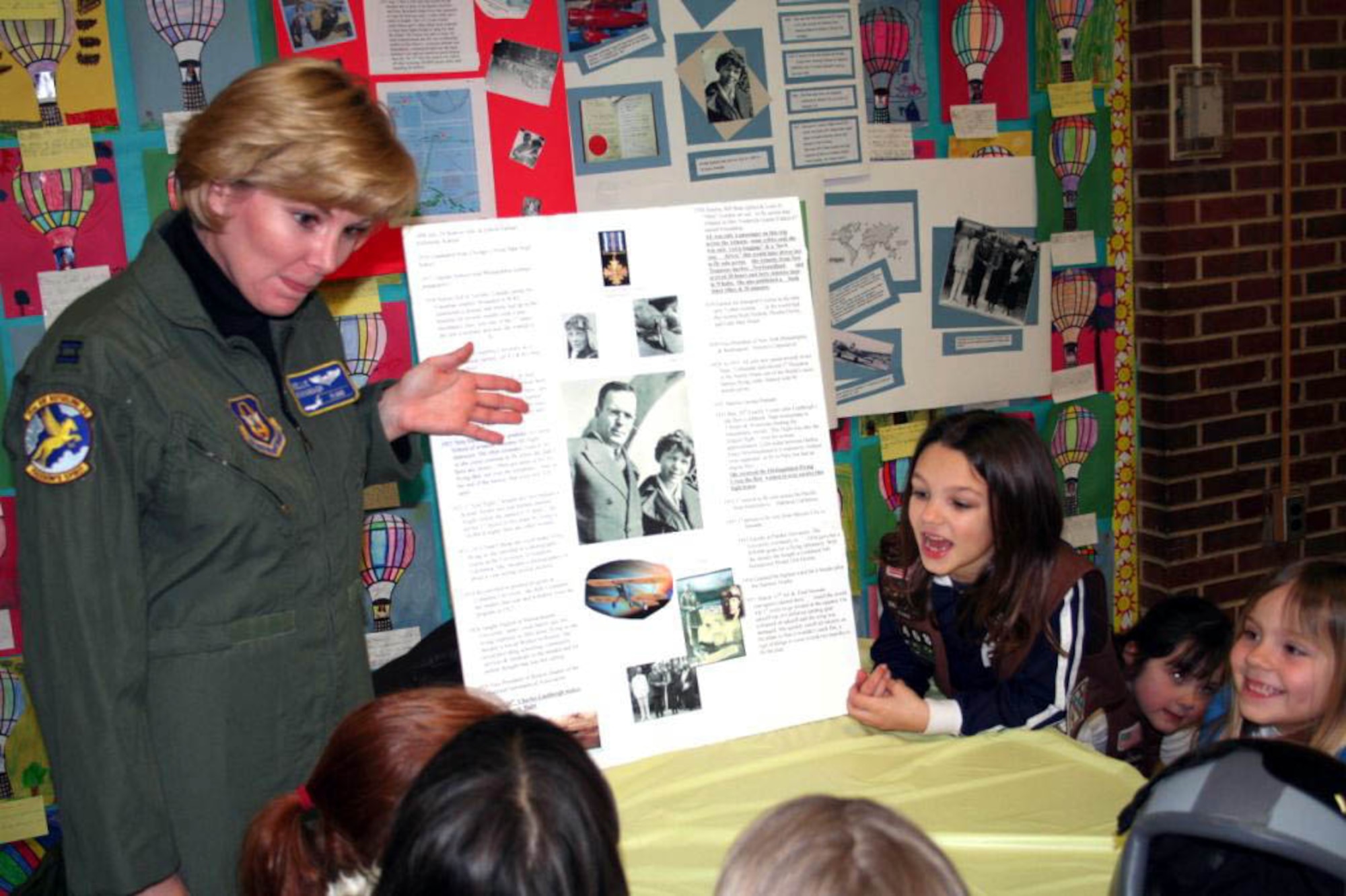 MCGUIRE AIR FORCE BASE, N.J. -- South Jersey Pine Girl Scout troops get the latest information about women in aviation from Capt. Kellie Kavanagh, a Reserve KC-10 pilot, during the scout's annual Thiinking Day Event held Feb. 23.  (U.S. Air Force photo/Brenda Ryan)