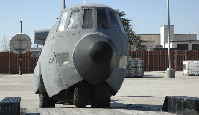 KEESLER AFB, Miss. -- Lil' Bill, a miniature model of the C-130J, was loaded up in support of local Mardi Gras parades. Lil' Bill was built by the 403rd Wing Fabrication Shop in 1999 to enhance community relations and outreach to the public. Lil' Bill will be sent to Dobbins ARB, Marrietta, Ga. to take part in several events throughout the next six months in the metro-Atlanta area leading up to Air Force Week, Oct.  8-14. The Air Force Week program is meant to increase the awareness and support of the public for our Airmen by informing them and involving them in activities that showcase our diverse capabilities and missions, our accomplishments and the sacrifice of our Airmen. (U.S. Air Force Photo/Maj. Chad Gibson)