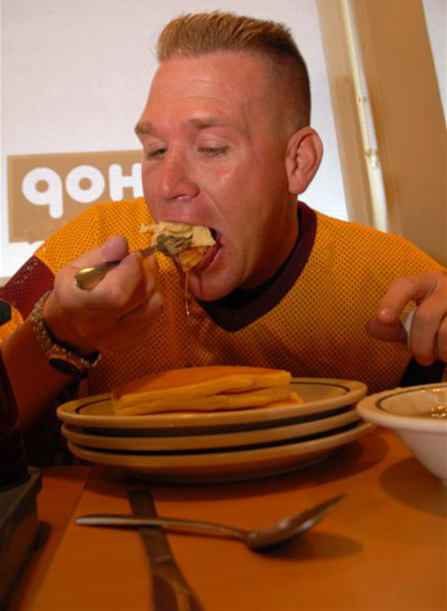 Staff Sgt. Jeff Tongate, a member of the San Angelo Stampede Express arena football team and a master instructor of Structural Firefighting Principles at the Louis F. Garland Department of Defense Fire Academy eats a mouth-full of pancakes during the 2007 Children Miracle Network's Pancake Eating Contest, Tuesday at the International House of Pancakes restaurant in San Angelo. Sergeant Tongate ate 15 pancakes in 20 minutes to finish as one of the top eaters in the competition. (U.S. Air Force photo by Tech. Sgt. Randy Mallard)