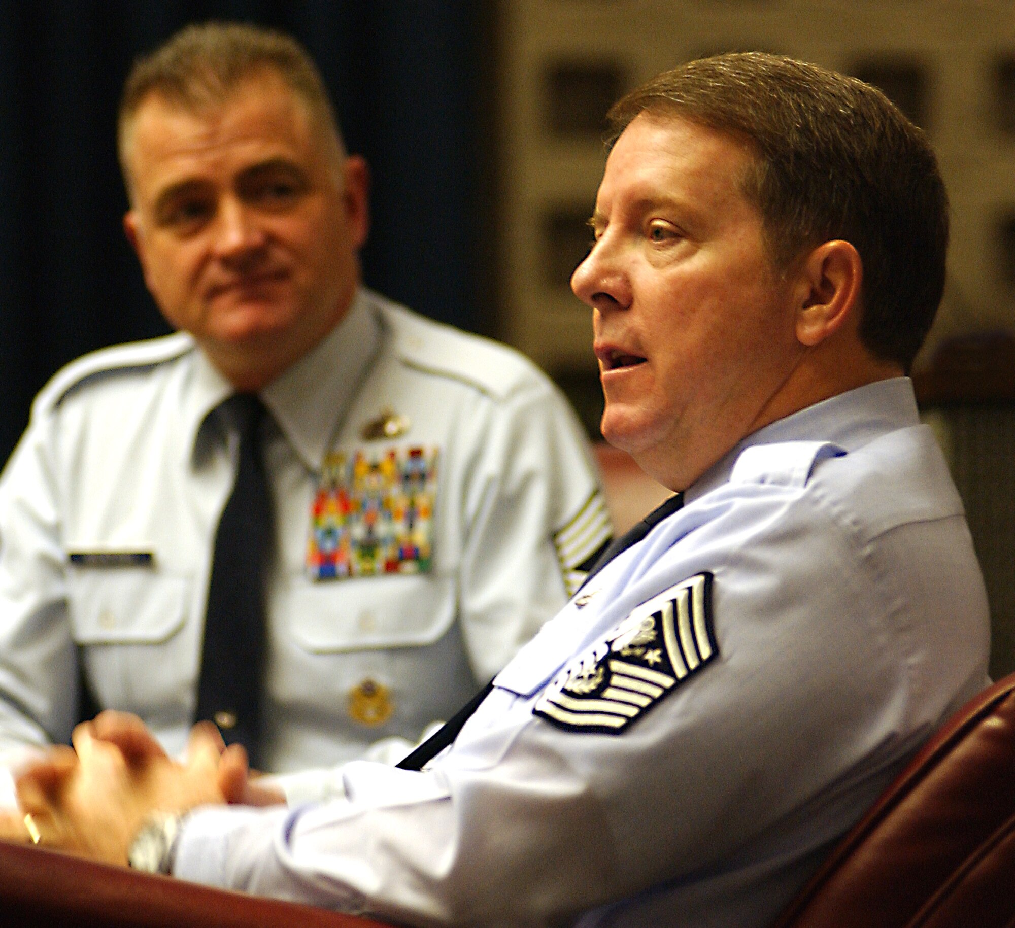 ROBINS AIR FORCE BASE, Ga. -- Chief Master Sgt. of the Air Force Rodney J. McKinley visits with Chief Master Sgt. Troy J. McIntosh and a host of other reservists at the 2007 AFRC Command Chief Master Sergeant and First Sergeant Conference, held here Feb. 23 at the Robins Conference Center. Chief McKinley addressed a range of topics—from the Airman Battle Uniform to Air Force heritage to his belief that the Reserve is critical to the success of the future Air Force. Chief McIntosh will become the AFRC command chief effective March 7. He will replace Chief Master Sgt. Jackson A. Winsett, who is retiring after 30 years of military service.  (U.S. Air Force photo/Staff Sgt. Paul Flipse)