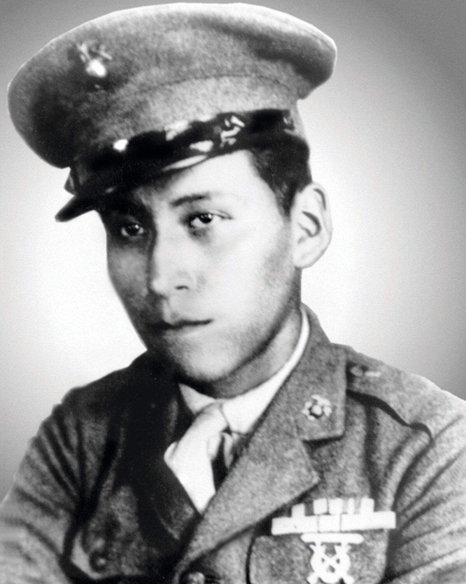 Cpl. Mitchell Red Cloud, Jr. enlisted in the U.S. Marine Corps in 1941 and was honorably discharged in 1945. He enlisted in the U.S. Army in 1948 and was sent to Korea in 1950. The only known photo in uniform is his WWII photo as a Marine. Navy photo.