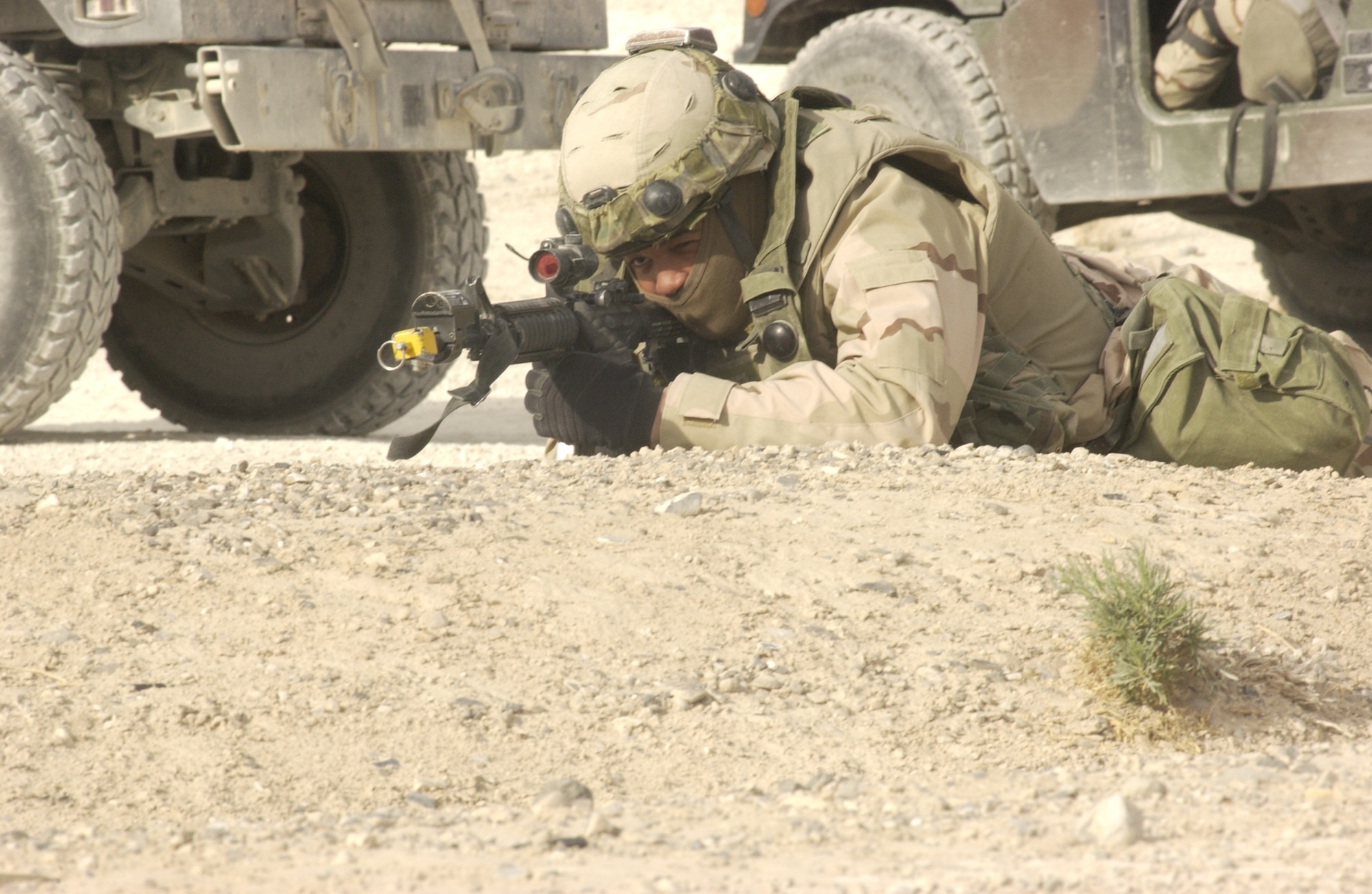 Staff Sgt William Abell, 509th Security Forces Squadron, Whiteman Air Force Base, Mo., provides cover for a convoy mission at a Ground Combat Training Squadron exercise at Creech AFB, Nev., on Feb. 18, 2007. The Ground Combat Training Squadron is responsible for training and testing security forces personnel on procedures for real-world scenarios that they will encounter during a deployment.    
(U.S Air Force Force photo by Airman 1st Class Nadine Y. Barclay)
