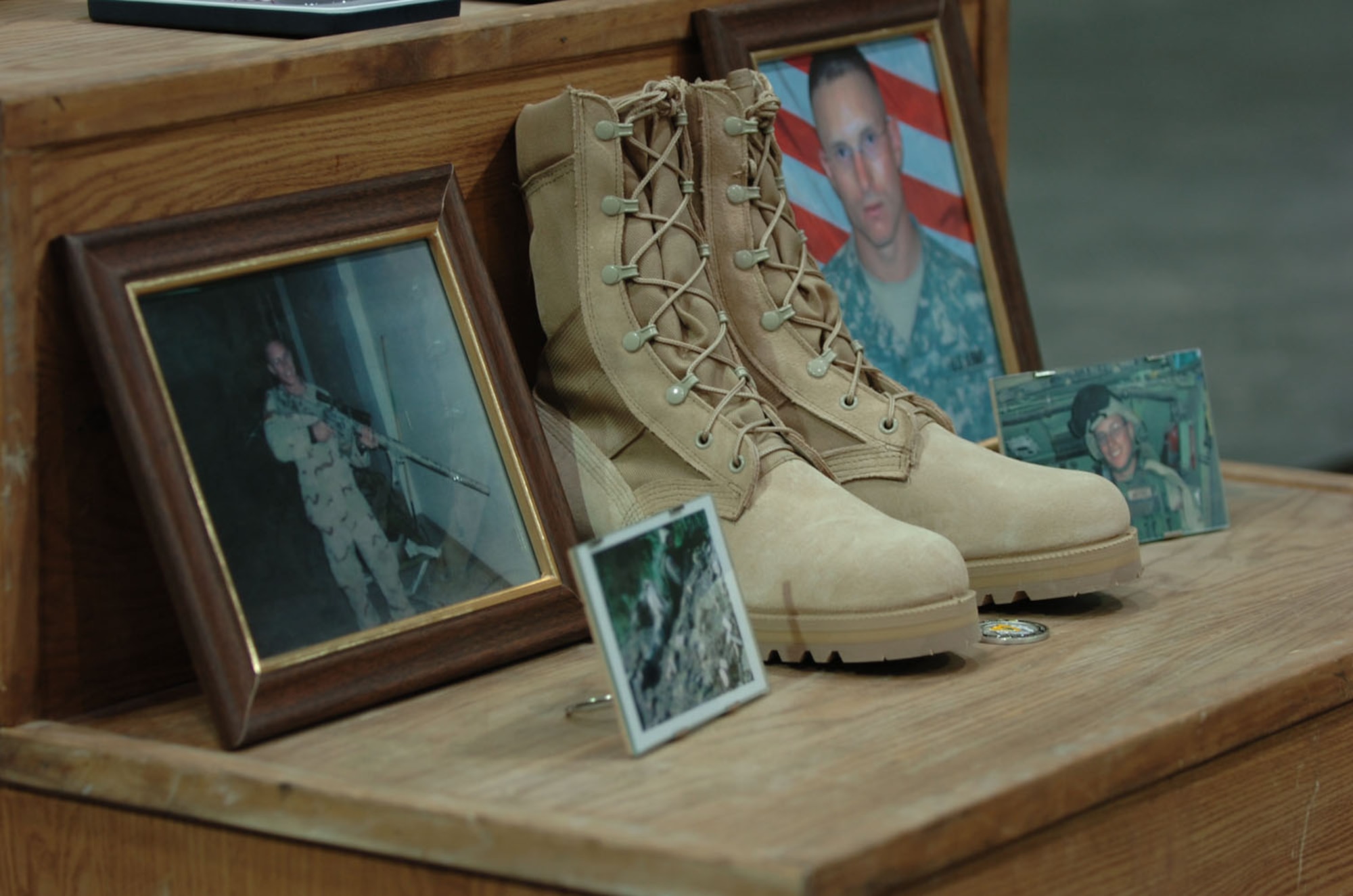 Staff Sgt. Daniel Morris’ combat boots and photographs serve as a reminder of his dedication to duty and of his sacrifice while doing what he believed in. (Courtesy photo)