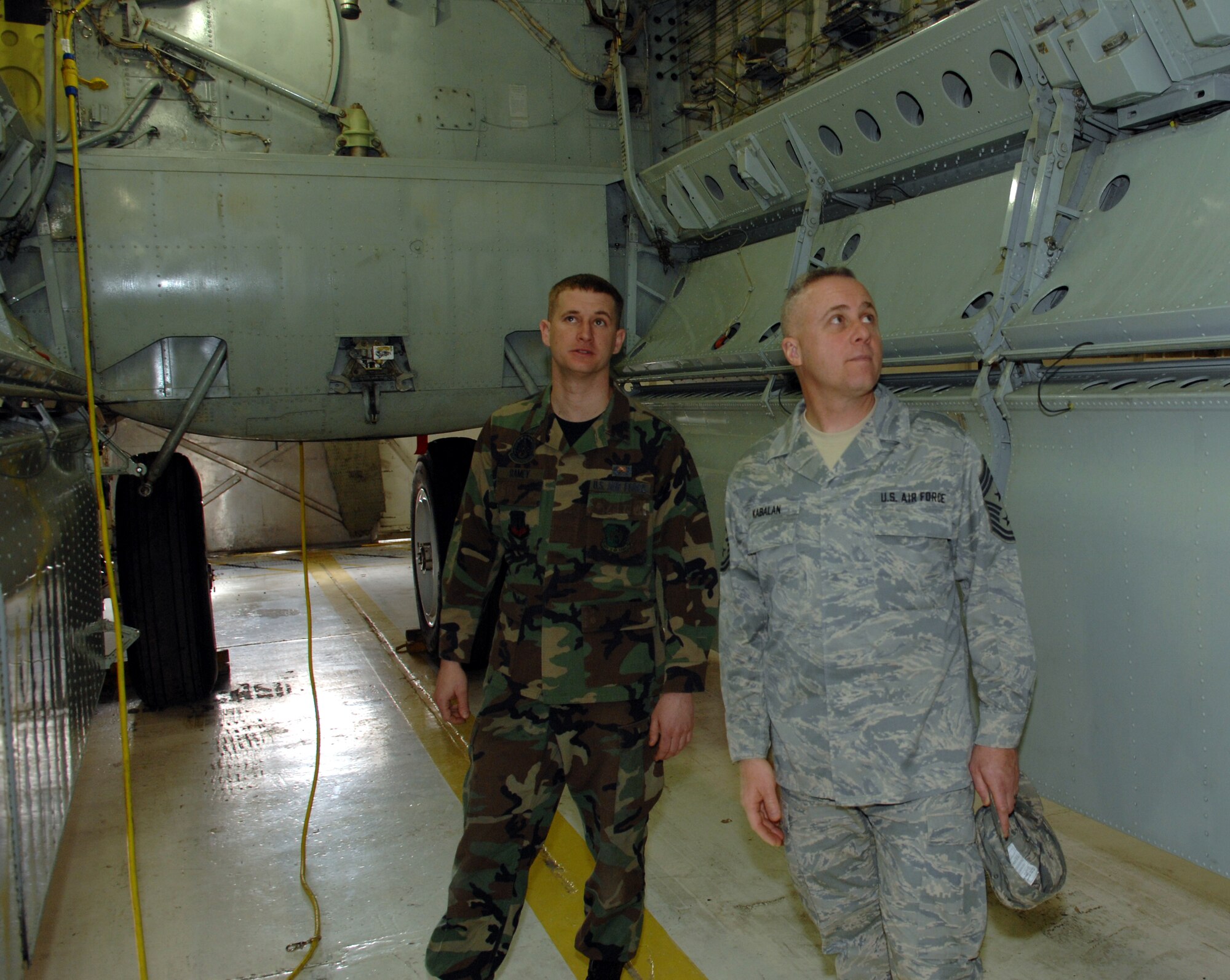 MINOT AIR FORCE BASE, N.D. – Chief Master Sgt. Todd Kabalan, 8th Air Force command chief, looks around the inside of a B-52H Stratofortress bomb bay Feb. 26 with Airman Lance Ramey, 5th Maintenance Squadron, during a visit to the base. This marked the chief’s first time at Minot. (U.S. Air Force photo by Airman 1st Class Cassandra Butler) 