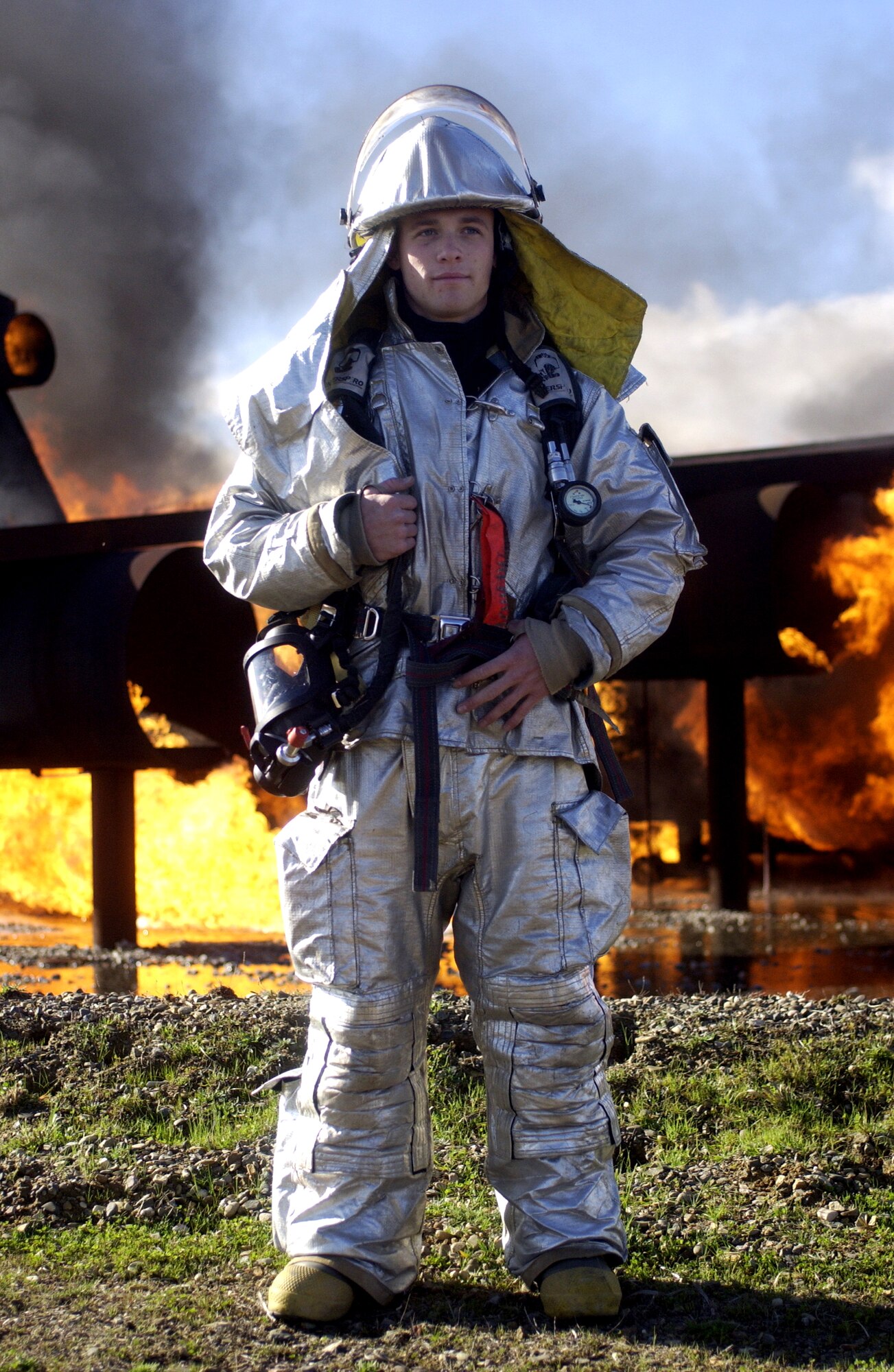 Senior Airman Keith Armour, a firefighter from the 30th Civil Engineer Squadron on Vandenberg, takes a quick break before going back to training during a base excercise on Feb. 13. Airman Armour just recently got back from a deployment in Iraq where he used this training in real-world situations. (U.S. Air Force photo by Airman Jonathan Olds)