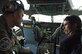 1st Lt. Brock Schnute, 14th Airlift Squadron pilot, talks to Michael Harper from the Space and Naval Warefare Center, about the C-17 during the Homeland Security orientation flight Feb. 22. (U.S. Air Force photo/ Staff Sgt. April Quintanilla)