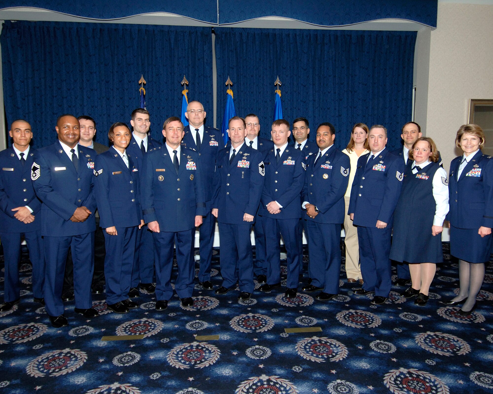 Major General Robert L. Smolen, AFDW commander (third from left) and Colonel Kim M. Johnson, 844th communications group commander (first from right) pose with the 2006 AFDW Communications and Information annual award winners.  (U. S. Air Force photo/Dennis Thomas, 844CG)
