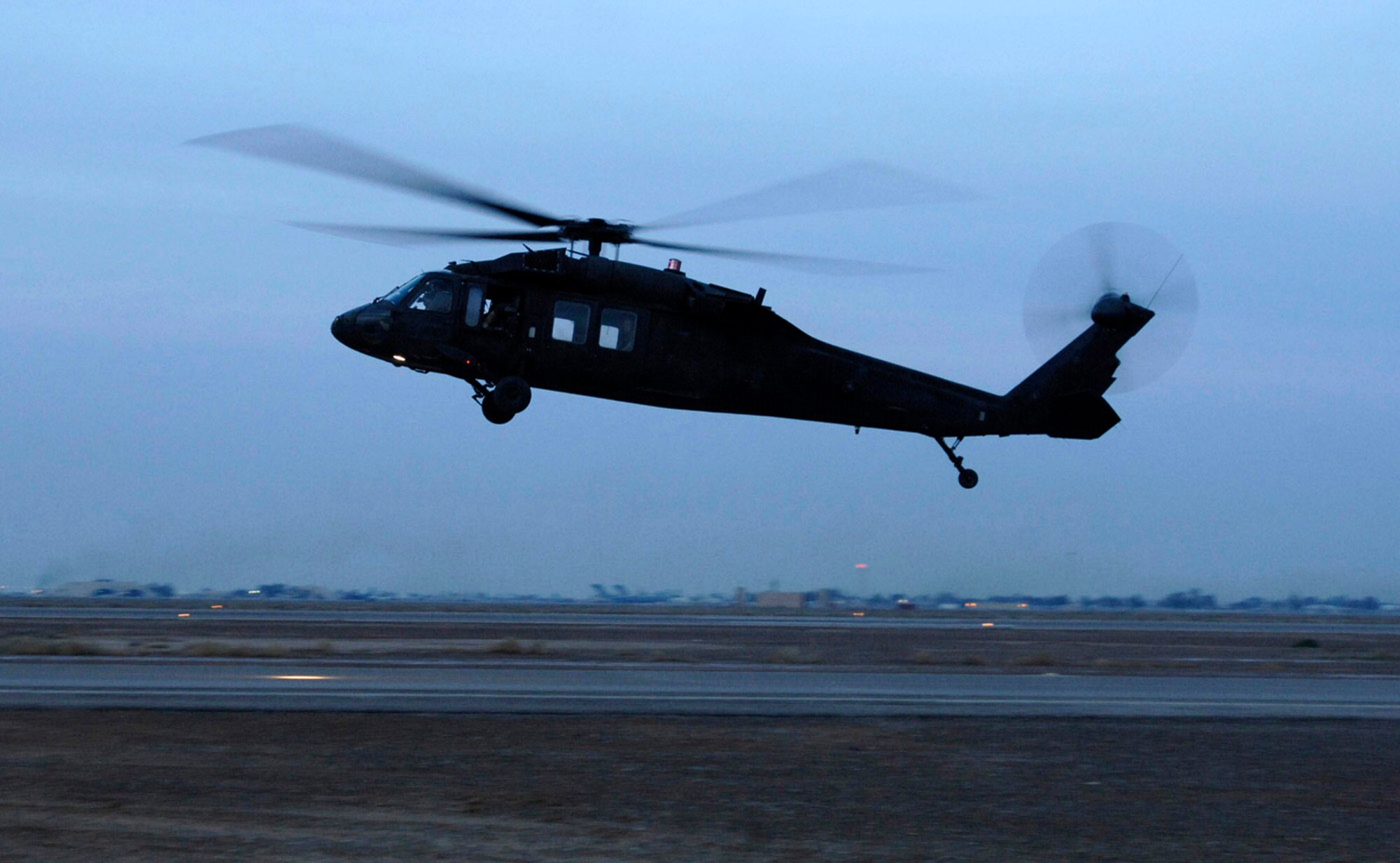 An HH-60G Pave Hawk aircrew take off for a combat search and rescue rehearsal mission Feb. 24 outside Balad Air Base, Iraq. They use these rehearsal missions to stay proficient. (U.S. Air Force photo/Tech. Sgt. Cecilio M. Ricardo Jr.)