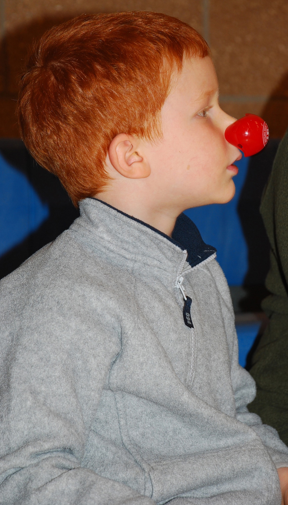 Christopher Eggleston watches the Circus Science show featuring Cherie and Dave Gregg, Goodwill Ambassador Clowns with Ringling Bros. and Barnum & Bailey Circus. Cherie and Gregg performed Feb. 24 at the Madrigal Youth Center. (U.S. Air Force photo/Tech. Sgt. Jennifer Isom)