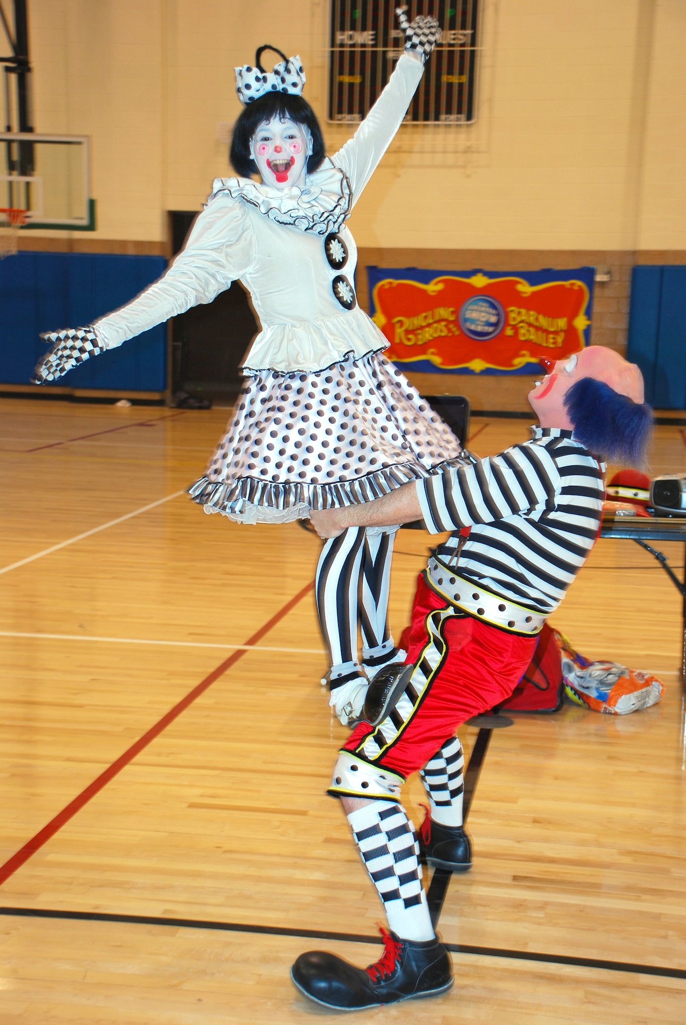 Cherie and Dave Gregg, Goodwill Ambassador Clowns with Ringling Bros. and Barnum and Bailey Circus performed Feb. 24 for Sheppard youth.  The clowns entertained the children with their Circus Science show at the Madrigal Youth Center. (U.S. Air Force photo/Tech. Sgt. Jennifer Isom)