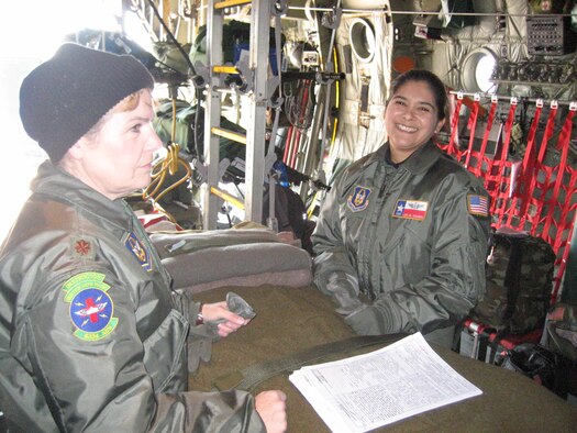 Maj. Barbara Sewick, left, a nurse, and Tech. Sgt. Lisa Hassell, a medical technician, are both deployed from the 433rd Aeromedical Evacuation Squadron to support the 775th Expeditionary Aeromedical Squadron's mission of transporting wounded within the United States. The stateside mission is performed primarily by Reservists on 60-day rotations. (U.S. Air Force Courtesy Photo)