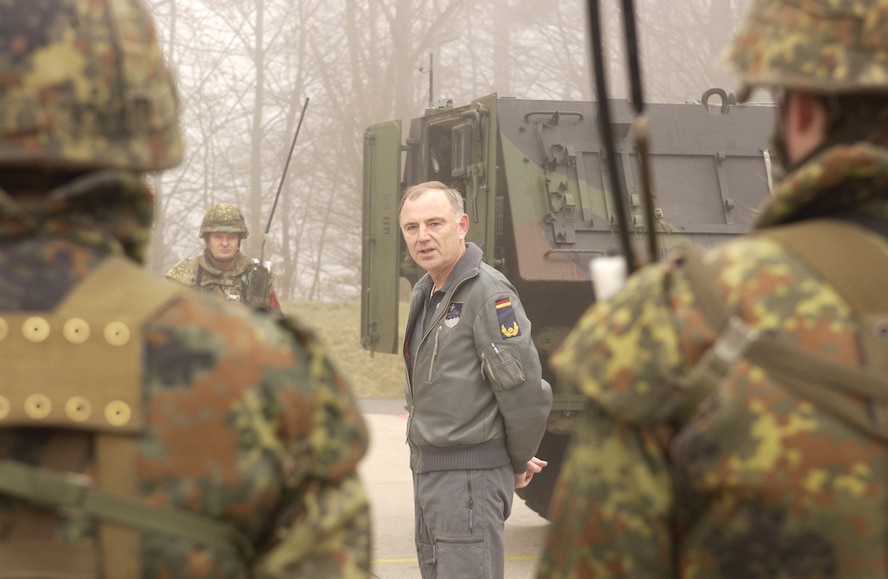 Brig. Gen. Harald Riedel, 2d Air Division deputy commander, German air force, addresses his troops about an exercise in which they recaptured a protected aircraft shelter at Buechel Air Base, Germany, Feb. 21, 2007.  (U.S. Air Force photo by Senior Airman Kristin Ruleau) 