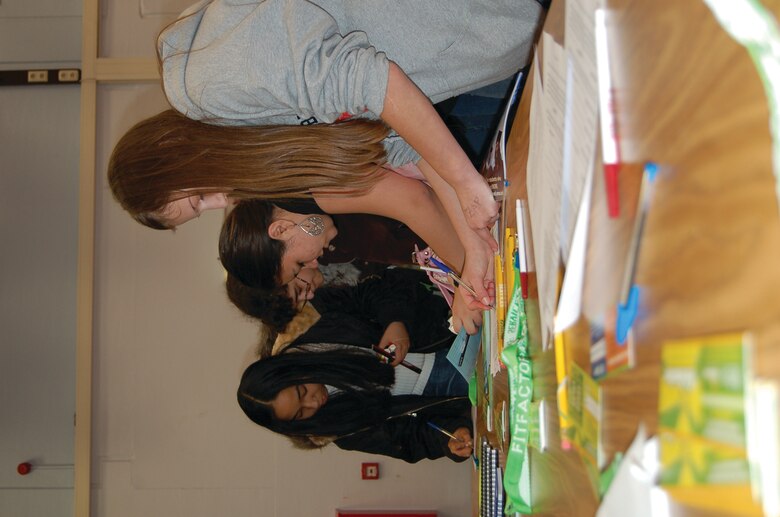 Bitburg High School students fill out forms at the  Career and a Future event. (US Air Force photo by Senior Airman Eydie Sakura)