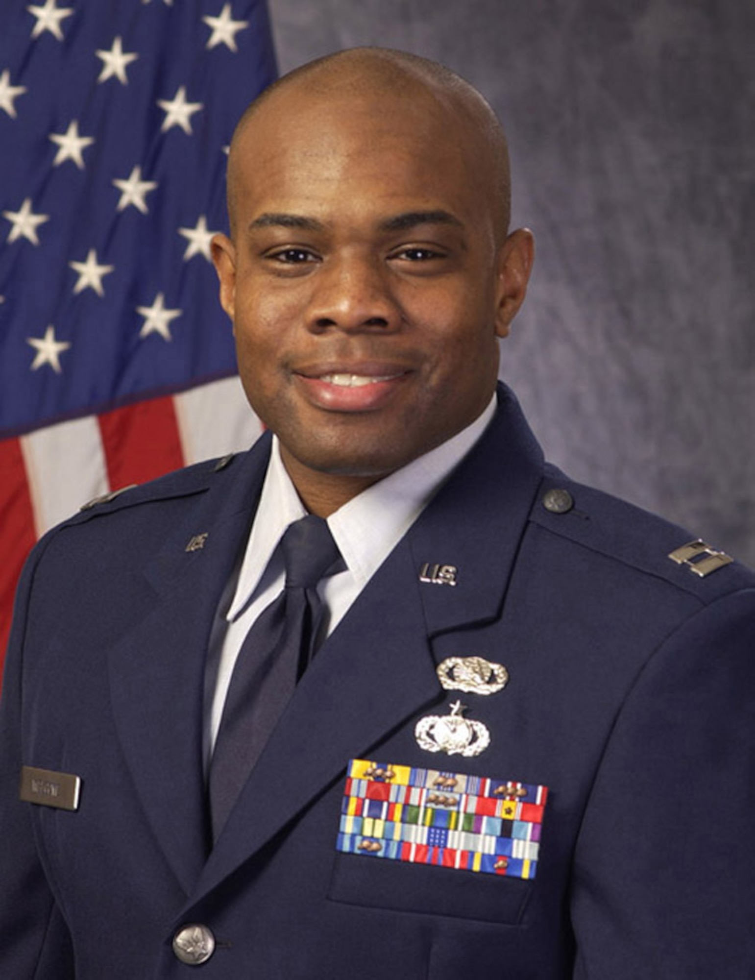 Capt. Erick Welcome, 35th Communications Squadron director of operations, was named Misawa Flight Commander of the Year for 2006.

What does being an annual award winner mean to him? "It is a blessing from God to have supportive leadership, peers and subordinates in an organization of true professionals." 
(U.S. Air Force photo by Manabu Matsuura)
