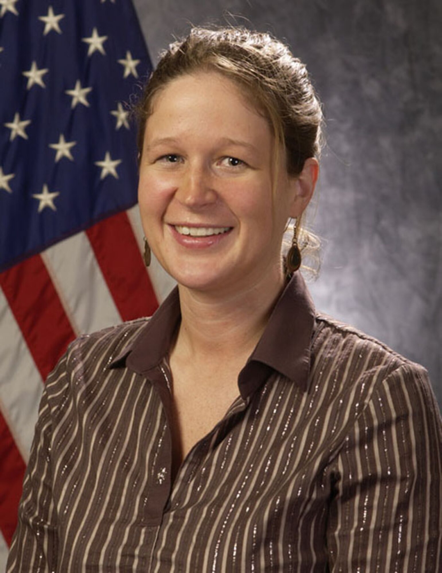 Base Civilian of the Year, Category I, for 2006
Jennifer Pittman, 35th Operations Group secretary, was named Base Civilian of the Year, Category I, for 2006.

What does being an annual award winner mean to her? "It means my work efforts are appreciated because others thought enough of me and my work to take the time to write a strong nomination package. I appreciate that a lot whether or not I win an award."
(U.S. Air Force photo by Manabu Matsuura)
