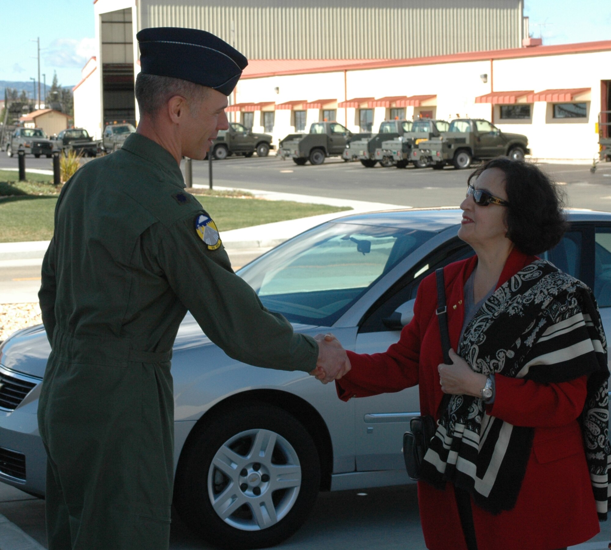 Lt. Col. Bryan Watt, 60th Operations Support Squadron commander, greets Ambassador Marcelle Wahba during her visit Feb. 23. Ambassador Wahba is the State Department's foreign policy adviser to the Air Force Chief of Staff, Washington, D.C. During her visit, she met with personnel from the 60th OSS, the 349th Aeromedical Evacuation Squadron and the 60th Aerial Port Squadron. (U.S. Air Force photo by Staff Sgt. Candy Knight)
