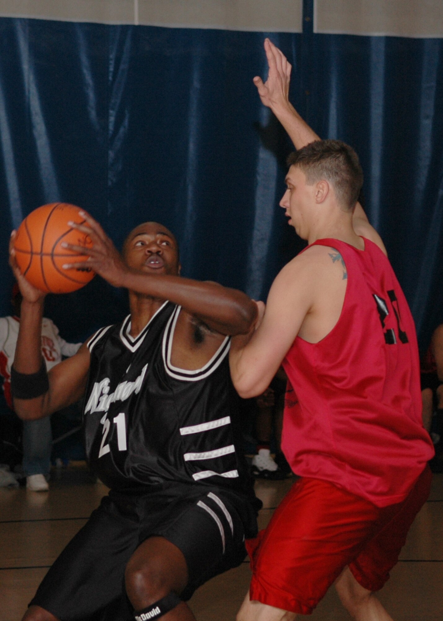 Holloman’s Akenty Frazer drives past a Cannon defender on his way to a layup during a tournament game Feb. 23. Frazer scored 11 points during the 87-77 victory over Holloman’s in-state ACC rival. (U.S. Air Force photo by Airman 1st Class John Strong)