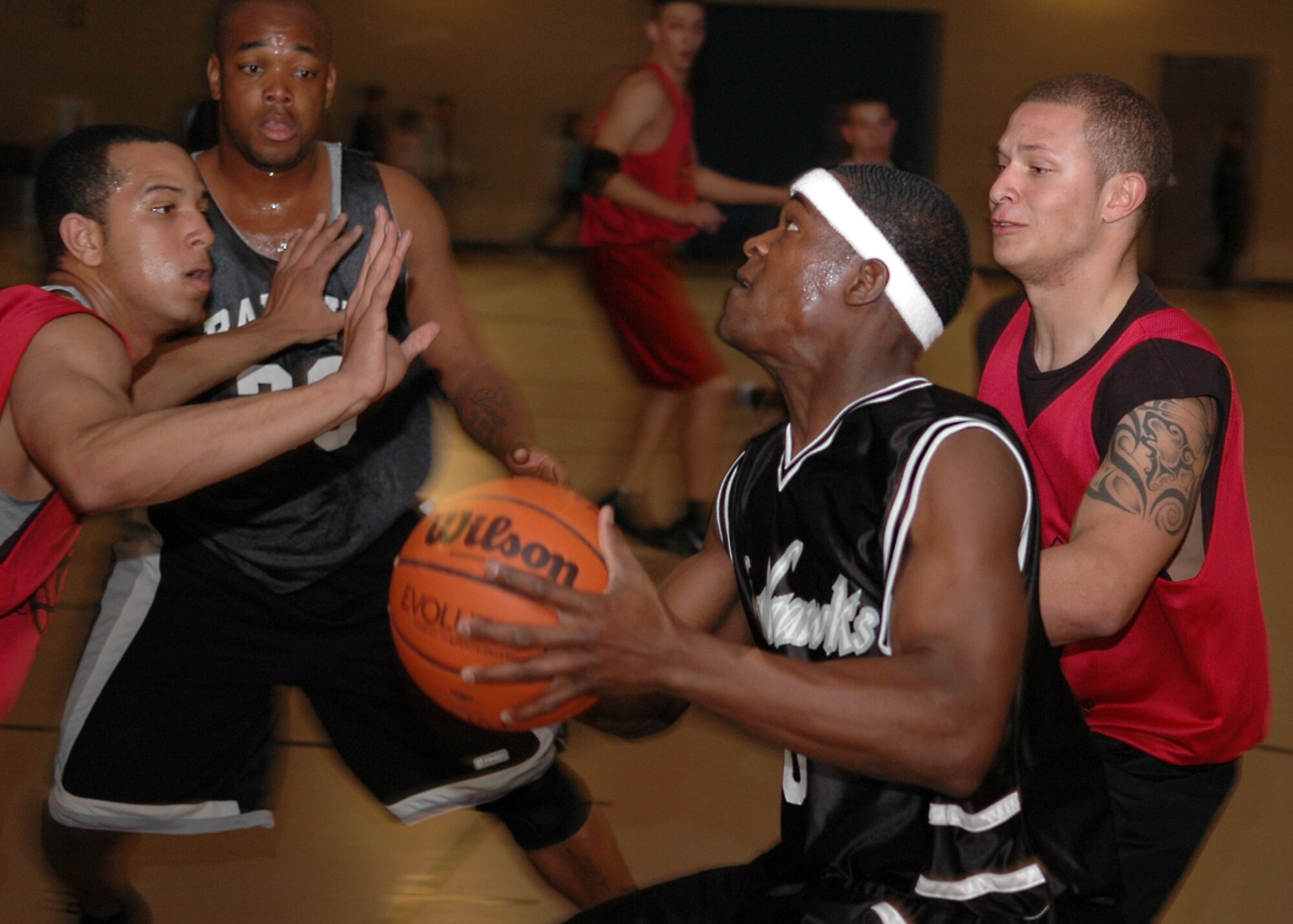 Cannon’s defenders were no match for Holloman’s offensive drives Feb. 23 when the two teams faced off during the opening round of a tournament held at Holloman’s Fitness and Sports Center. The tournament attracted seven teams from across the Southwest and was eventually won by the New Mexico All Stars, from Albuquerque.
 (U.S. Air Force photo by Airman 1st Class John Strong)