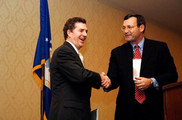 South Carolina Senator Jim Demint, shakes hands with Craig Solem, Homeland Security Conference task force chairman, after the senator's speech at the Charleston Club Feb. 21. Nearly 100 people from local government agencies and businesses attended the conference. (U.S. Air Force photo/Staff Sgt. April Quintanilla)
