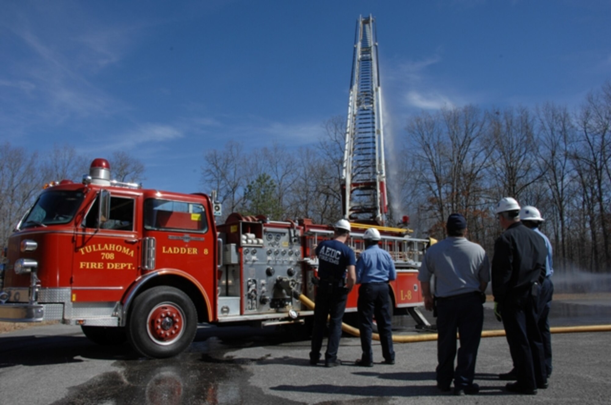 Tullahoma firefighters demonstrate their 75-foot aerial platform truck to their Arnold Engineering Development Center counterparts during a day of training. 