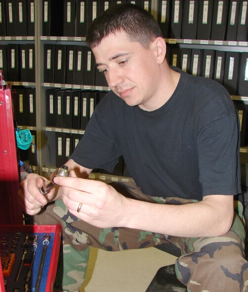 Staff Sgt. Johnathan Kovar, 7th Aircraft Maintenance Squadron support flight specialist, organizes tools in a tool box in the newly consolidated support flight. The consolidated support flight has cut time in half for maintainers and support specialists.                               