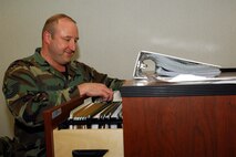 MINOT AIR FORCE BASE, N.D. – Master Sgt. Mark Kauer, 5th Mission Support Squadron, looks through some files in the military personnel flight office Feb. 26. Sergeant Kauer recently received the Air Combat Command Vanguard Award for 2007. (U.S. Air Force photo by Airman 1st Class Sharida Bishop)