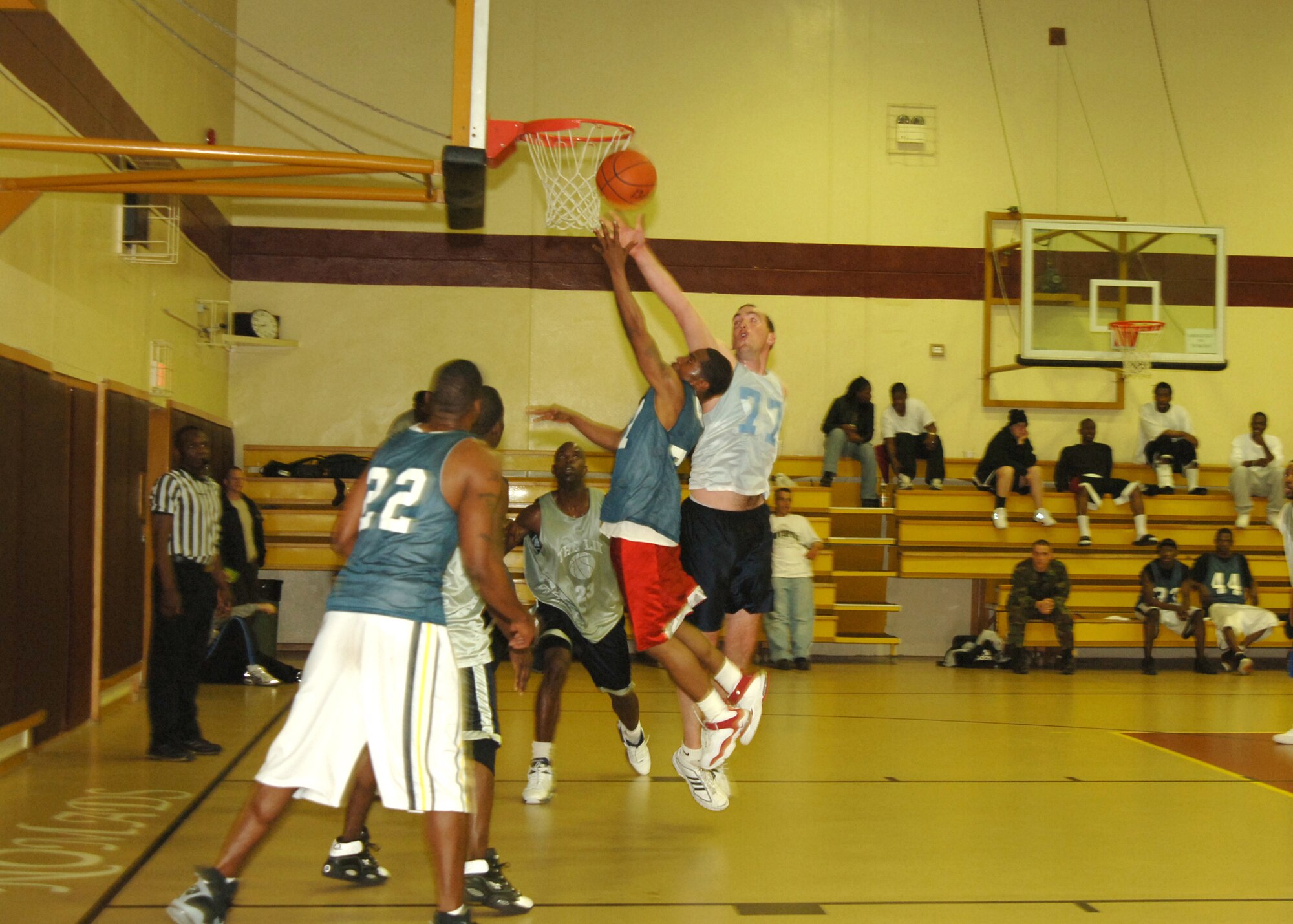 The 39th Security Forces Squadron (in blue jersey's) up ended the 39th Civil Engineer/Mission Support/Services Squadron, 68-60, in intramural basketball to force a championship finale at 7 p.m. tonight at the Fitness Center. (U.S. Air Force photo by Airman 1st Class Kelly Leguillon)