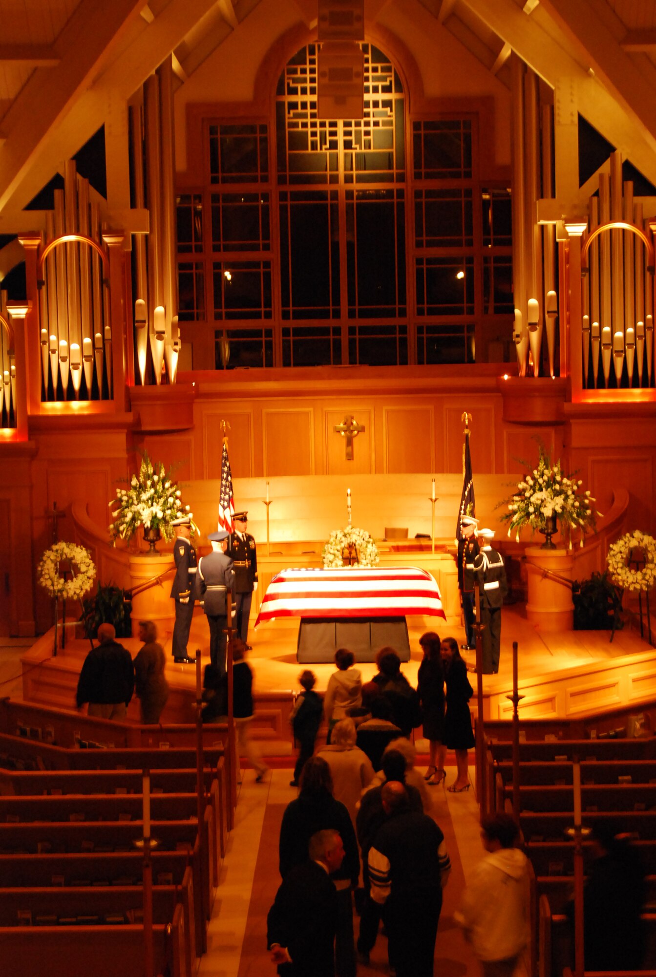 Former President Gerald R. Ford lies in repose at St. Margaret's Episcopal Church in Palm Desert, California, as citizens from the surrounding community pay their respects. More than 500 military members are in Palm Desert supporting the California portion of the State Funeral for the former president. The military is providing ceremonial, logistics, and security support to honor and pay tribute to the former Commander-in-Chief and the Ford family. Ford died in Palm Desert, California, Dec. 26 at the age of 93. (U.S. Air Force Photo/1st Lt Carrie L. Kessler)