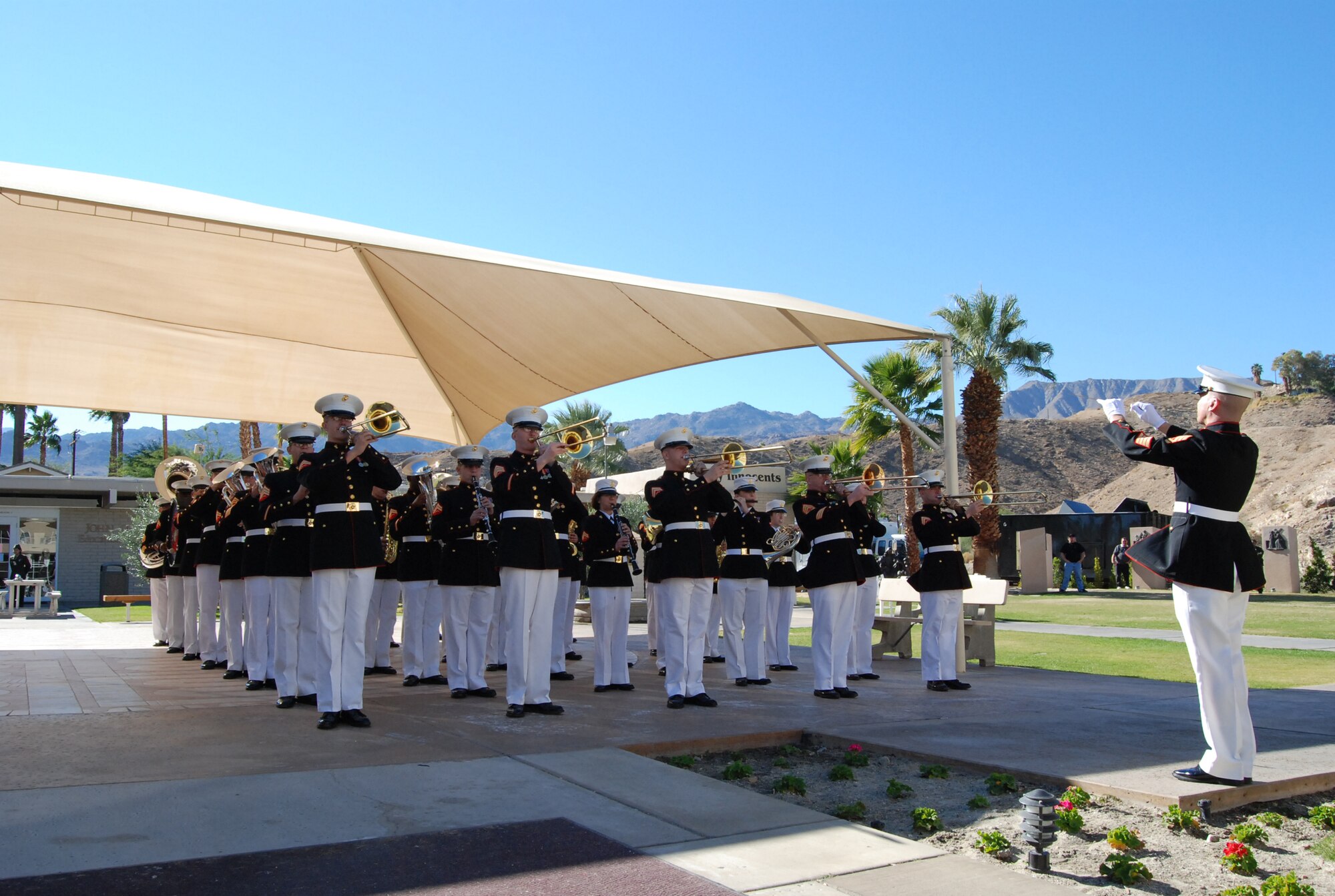 The 42-member Marine Air Ground Combat Center Band, from Twentynine Palms, California, rehearses "Ruffles and Flourishes" Dec. 29 at St. Margaret's Episcopal Church in Palm Desert, California, prior to the arrival of the former President Gerald R. Ford's remains. More than 500 military members are in Palm Desert supporting the California portion of the State Funeral for former president. The military is providing ceremonial, logistics, and security support to honor and pay tribute to the former Commander-in-Chief and the Ford family. Ford died in Palm Desert, California, Dec. 26 at the age of 93. (U.S. Air Force Photo/1st Lt Carrie L. Kessler)