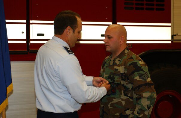 Staff Sgt. Darrell Tirpak, 56th Civil Engineer Squadron firefighter, was awarded the Air Force Commendation Medal by the 56th Fighter Wing Commander, Brig. Gen. Tom Jones Dec. 29, 2006.
