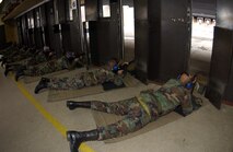 MINOT AIR FORCE BASE, N.D. -- Airmen here test fire the M-16 rifle to recertify their Air Force weapons qualification at the combat arms training and maintenance firing range Jan. 4. Each Airman fires 100 rounds from various distances and stances to become efficient with the weapon. (U.S. Air Force photo by Airman Sharida Bishop)                           