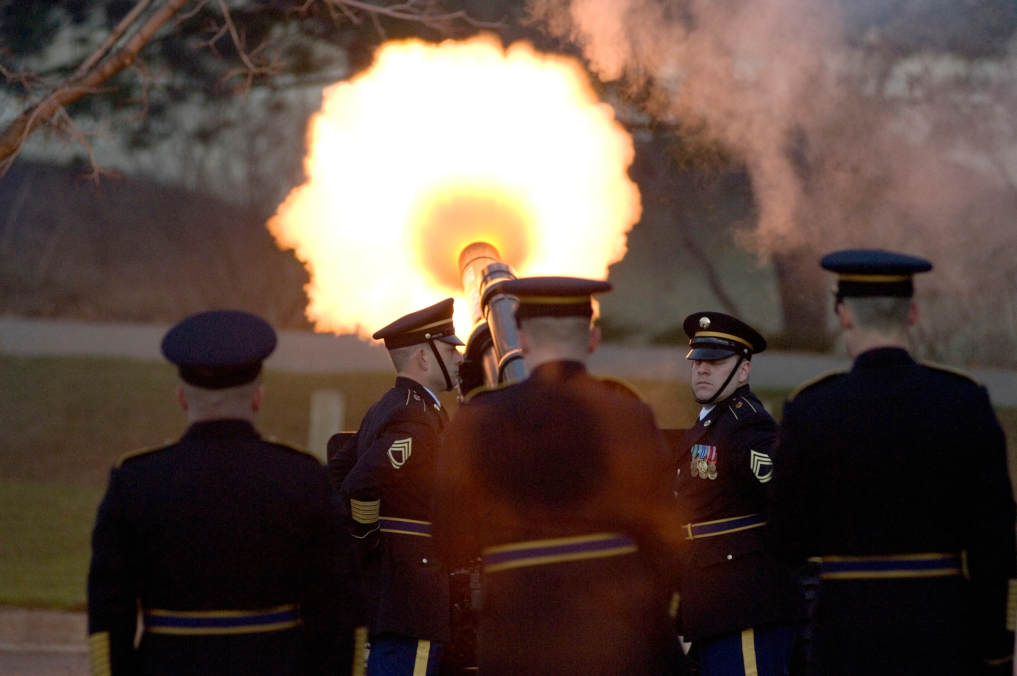 The 1st Battalion of the Michigan National Guard's 119th Field Artillery Regiment fires off a canon during the 21-gun salute to honor President Gerald R. Ford at the Gerald R. Ford Presidential Library and Museum Jan. 3 in Grand Rapids, Mich. (U.S. Air Force photo/Tech. Sgt. Cecilio M. Ricardo Jr.)