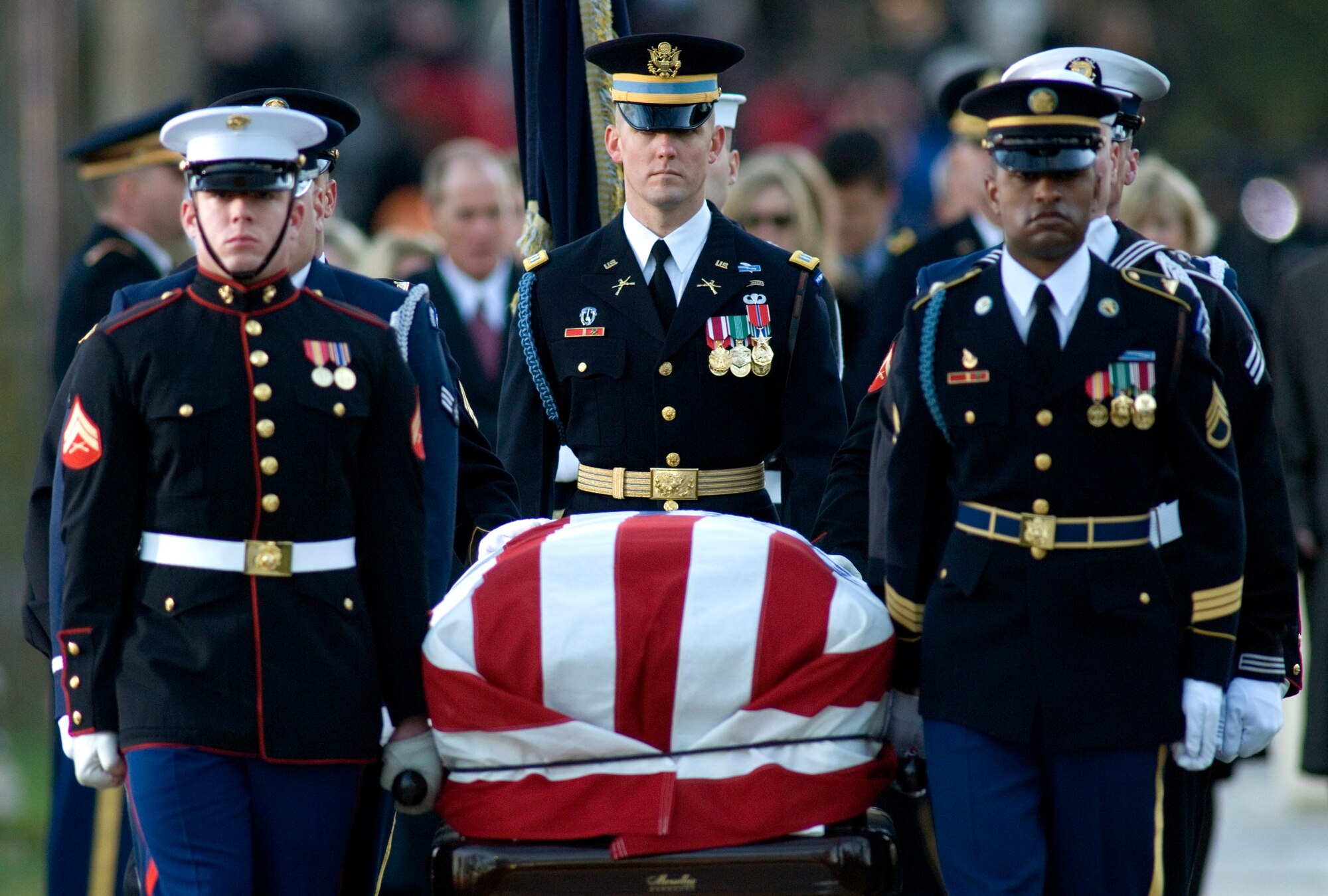 Armed Forces Honor Guard body bearers carry President Gerald R. Ford for his internment at the Gerald R. Ford Presidential Library and Museum Jan. 3 in Grand Rapids, Mich. (U.S. Air Force photo/Tech. Sgt. Cecilio M. Ricardo Jr.)