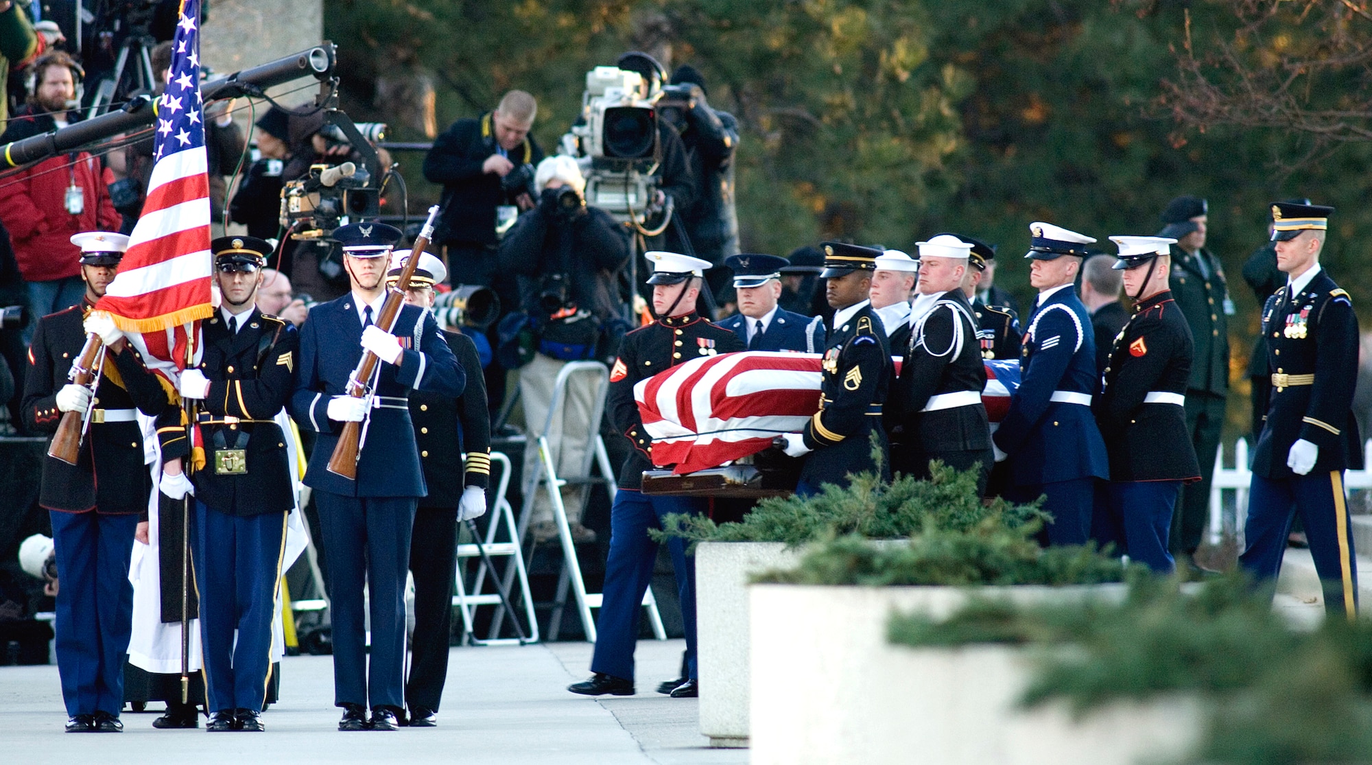 Armed Forces Honor Guard and body bearers carry President Gerald R. Ford for his internment at the Gerald R. Ford Presidential Library and Museum Jan. 3 in Grand Rapids, Mich. (U.S. Air Force photo/Tech. Sgt. Cecilio M. Ricardo Jr.)
