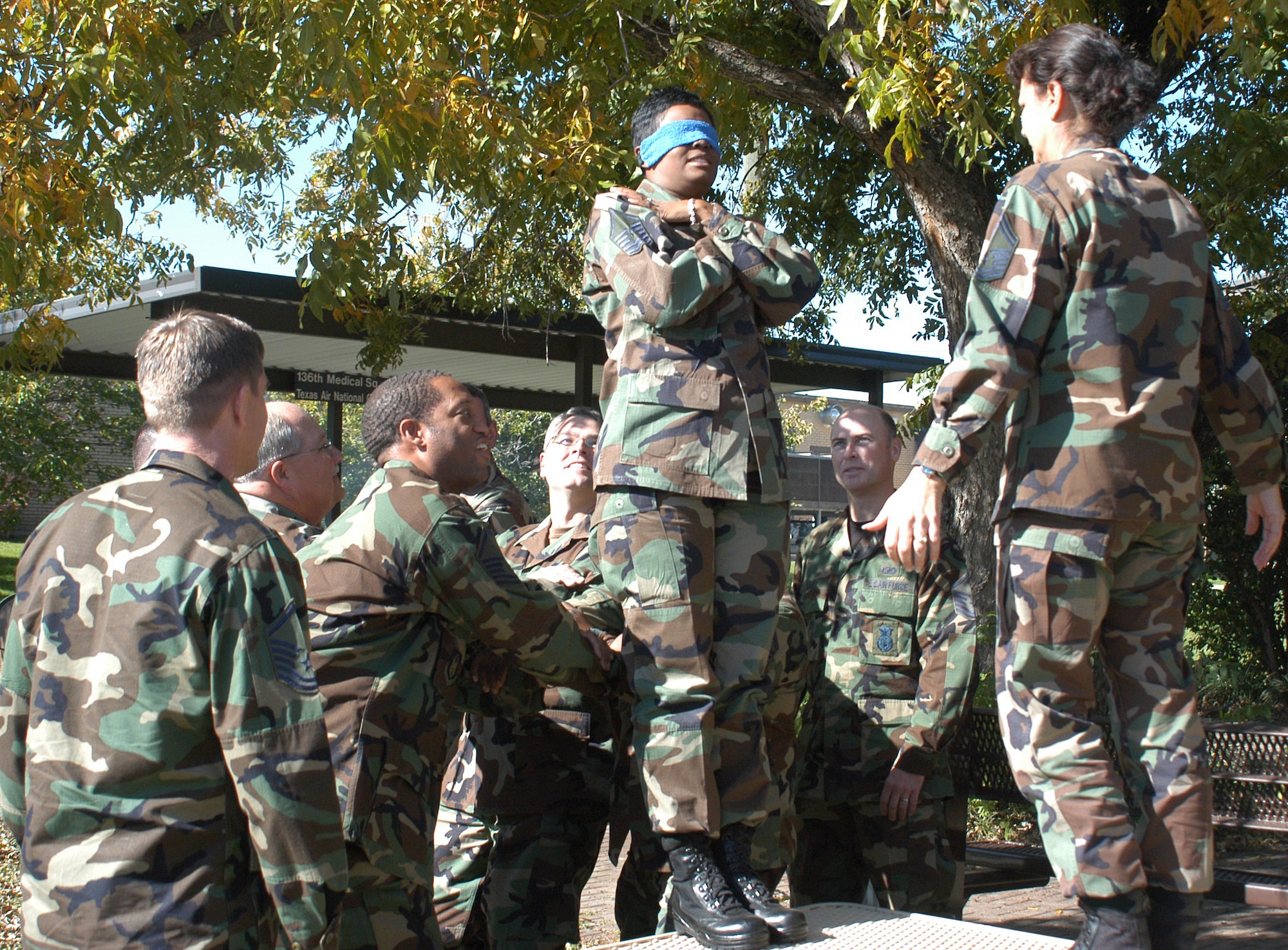 Members of the Air Force Reserve Command's Senior NCO Leadership Development Course, first of its kind to be hosted by the 301st Fighter Wing, participate in an exercise of total trust. (U.S. Air Force Photo/Staff Sgt. Kristin Mack)