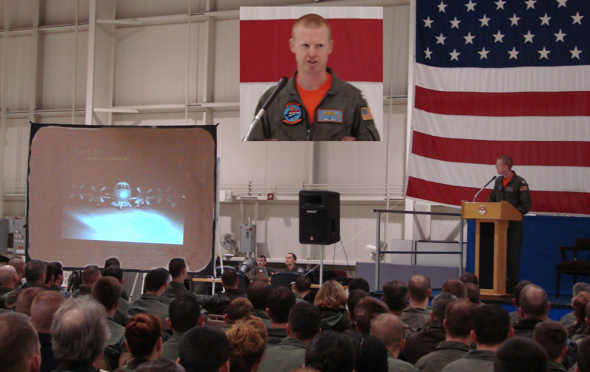 Navy LT Jeff Vignery, (at podium and inset), Naval Air Station Corpus Christi, Texas, describes the EP-3E, the type of aircraft he was co-piloting when it made an emergency landing on China’s Hainan Island. The landing followed a mid-air collision with a Chinese fighter aircraft on April 1, 2001. Lieutenant Vignery was the featured speaker for Wednesday’s January Challenge Safety Day at Vance Air Force Base.(Photo illustration by Frank McIntyre)        