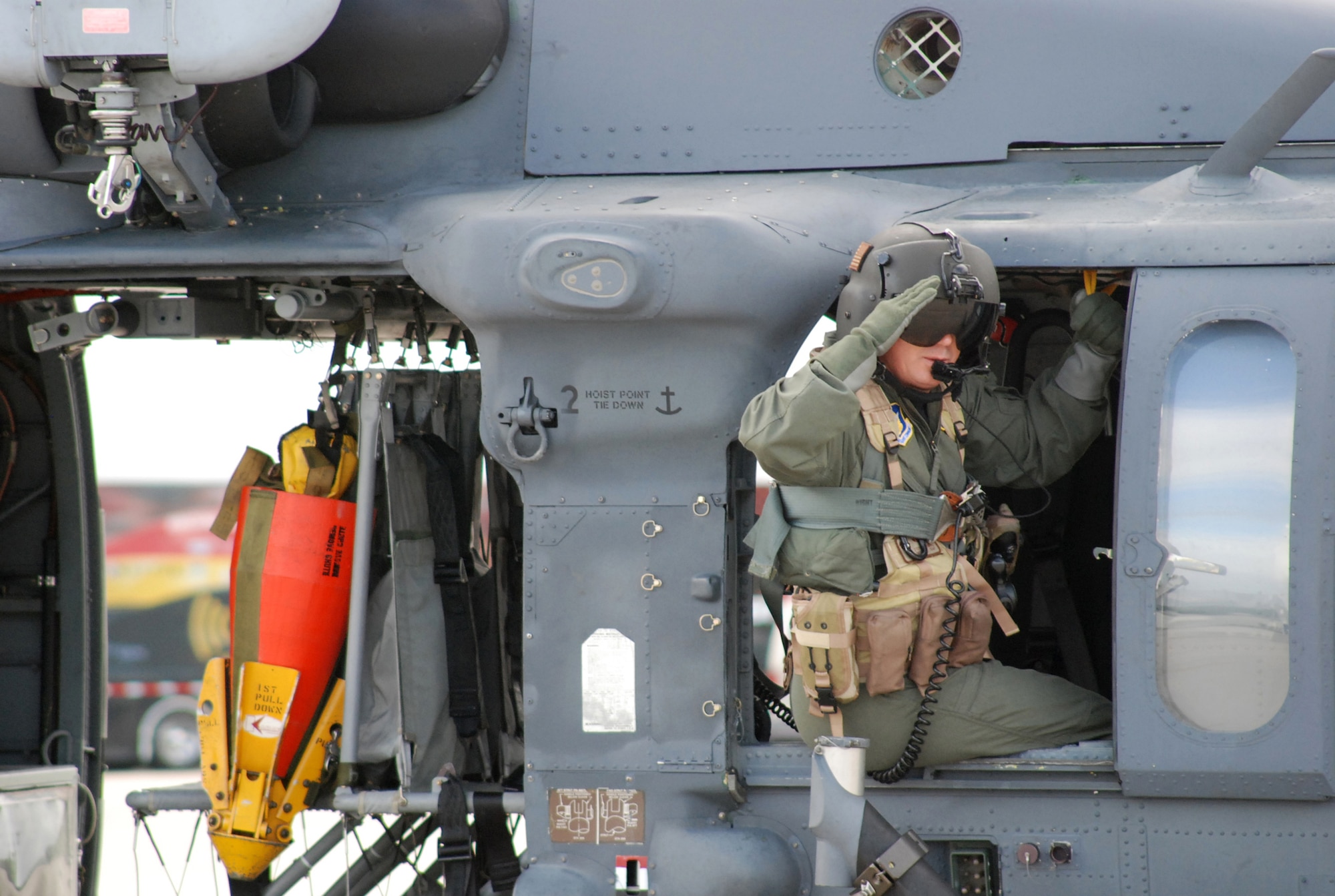 In the 920th Rescue Wing's HH-60 Pave Hawk, Senior Master Sgt. Stephen Schwarz, 920th Rescue Squadron, bids farewell after taking 35 Civic Leaders and their 301st Fighter Wing Air Force Reserve escorts from the Dallas-Fort Worth area on an aerial tour around Cape Canaveral. (U.S. Air Force Photo/Tech. Sgt. Julie Briden-Garcia)