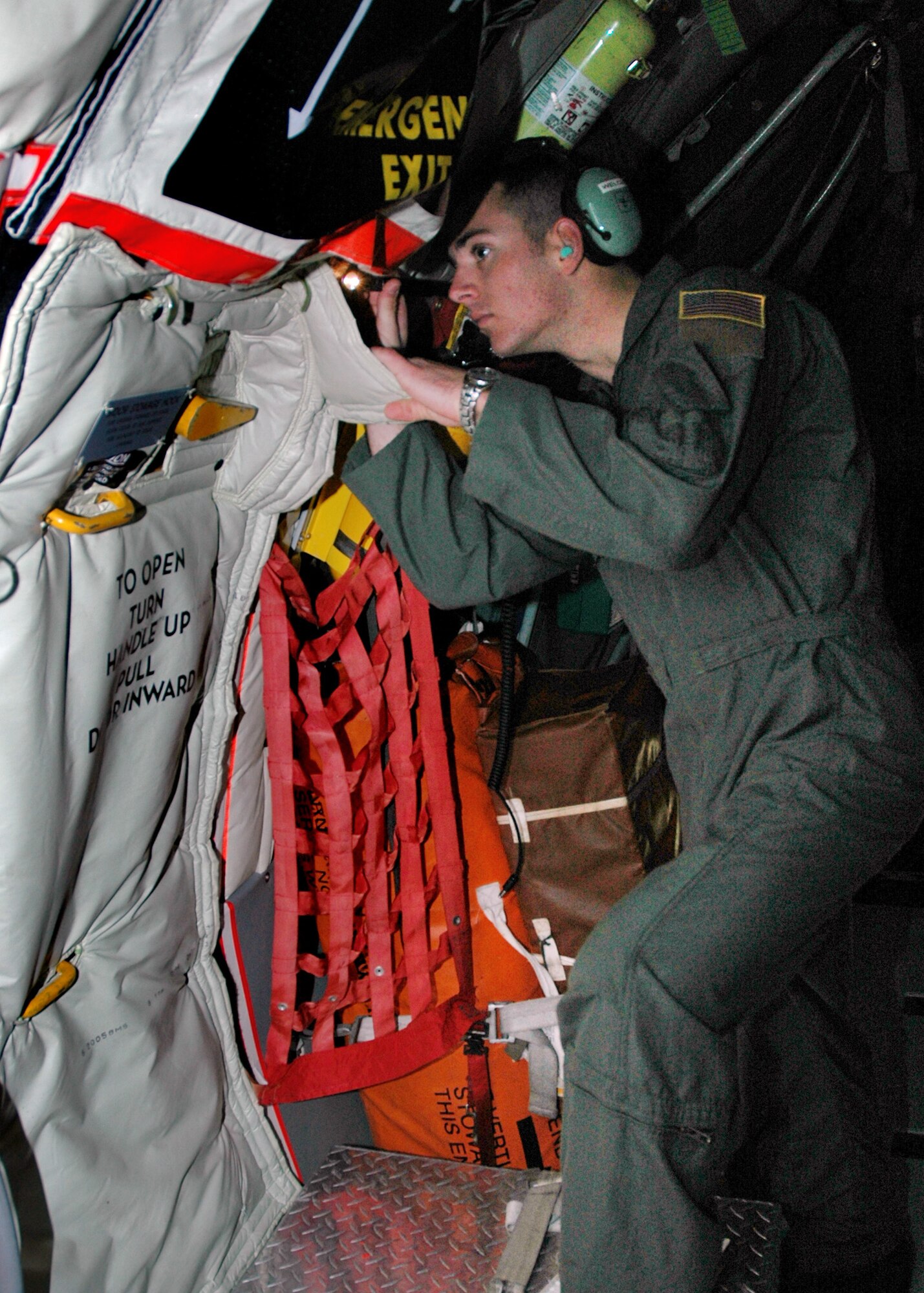 Airman 1st Class Lance M. Welch, boom operator with the Air Force Reserve Command's 940th Air Refueling Wing, inspects the interior of a KC-135 Stratotanker prior to a scheduled training mission Jan. 3, 2007 at Beale Air Force Base, Calif. Safety is an Air Force priority. (U.S. Air Force photo/Staff Sgt. Luke Johnson)