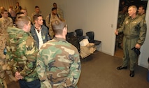 MINOT AIR FORCE BASE, N.D.  -- Col. Eldon Woodie, 5th Bomb Wing commander, wishes 23 Airmen good luck before leaving for a forward-deployed location Jan. 5 for Air and Space Expeditionary Force 5/6. The Airmen are deploying for 120 days and are scheduled to return here in the spring. (U.S. Air Force photo by A1C Christopher Boitz)