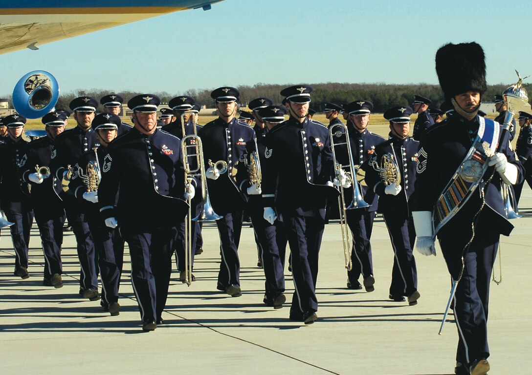 ANDREWS AFB, Md. -- The U.S. Air Force Band, Bolling Air Force Base, Washington, marches off the flight line Tuesday after playing "Ruffles and Flourishes," "Hail to the Chief" and "Goin’ Home" during the departure ceremony for former President Gerald R. Ford.
(U.S. Air Force photo by Bobby Jones)(Released)