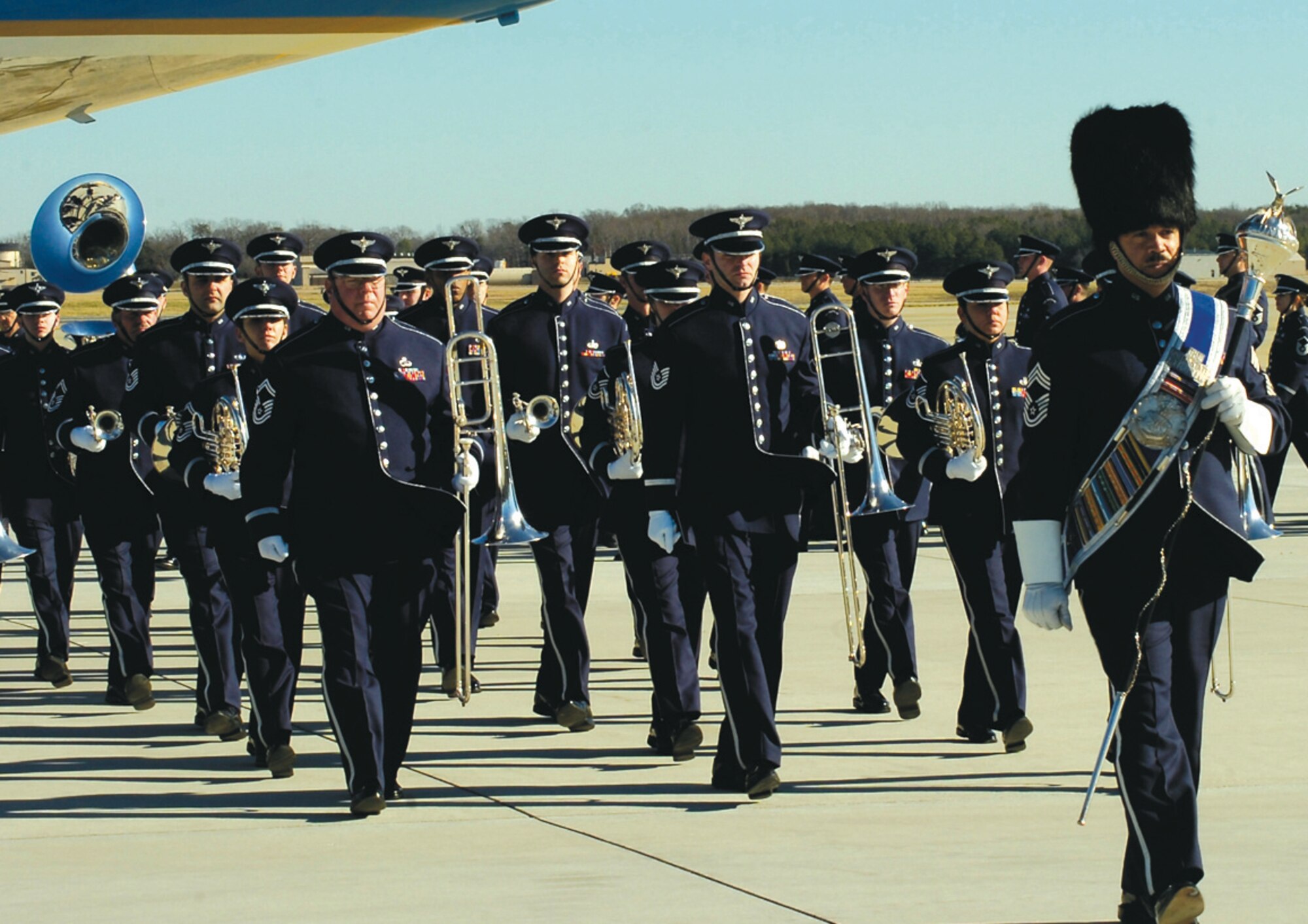 ANDREWS AFB, Md. -- The U.S. Air Force Band, Bolling Air Force Base, Washington, marches off the flight line Tuesday after playing "Ruffles and Flourishes," "Hail to the Chief" and "Goin’ Home" during the departure ceremony for former President Gerald R. Ford.
(U.S. Air Force photo by Bobby Jones)(Released)