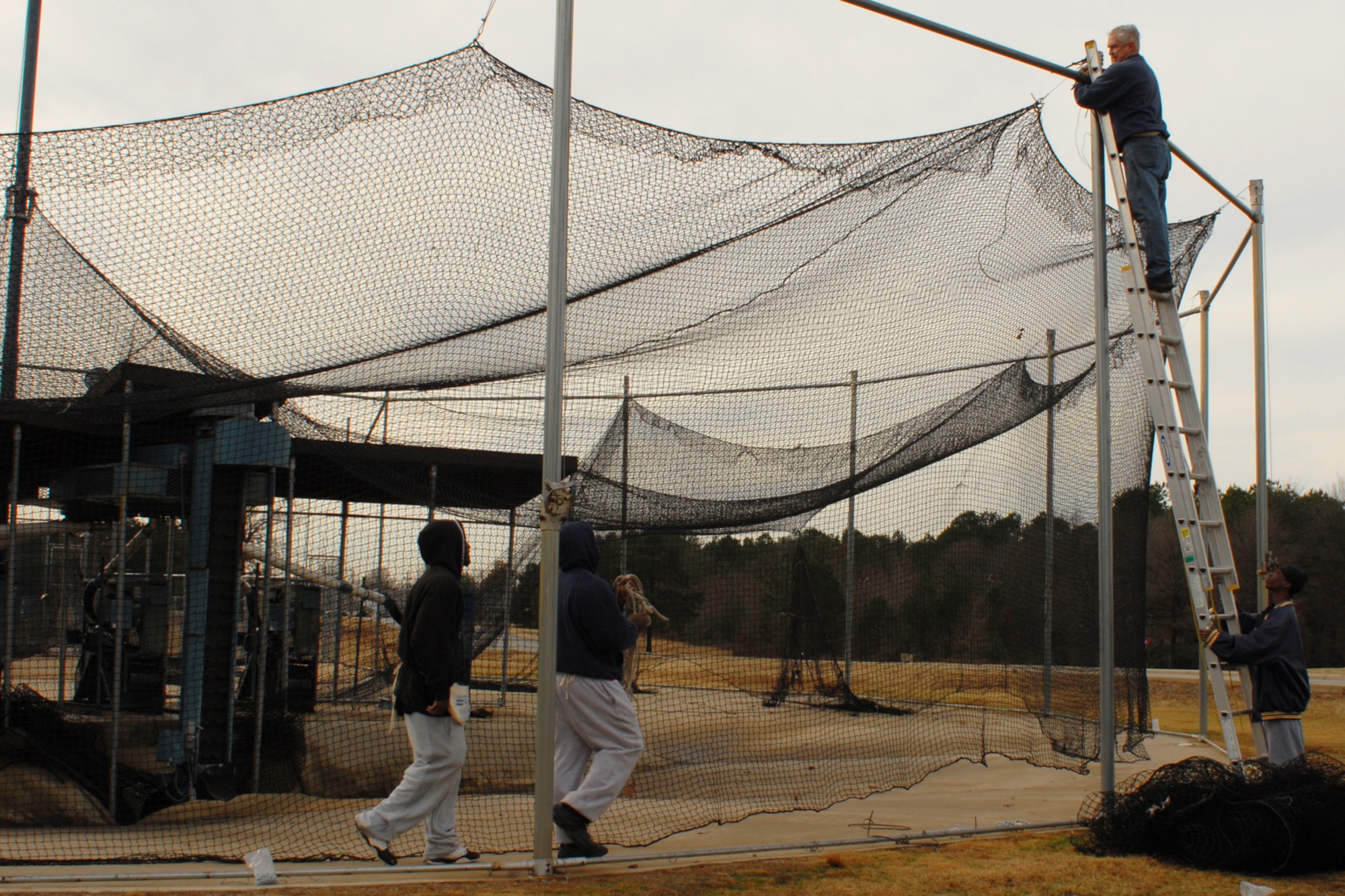 Dave Kent installs new netting for the base batting cages as part of a renovation project. This is the first major renovation to the batting cages since their installation in 1998. The rejuvenation of the batting cages falls in line with youth baseball and softball season registration, which begins Jan. 29. For more information on the youth baseball/softball season or registering, call the Youth Center at 987-6355.
