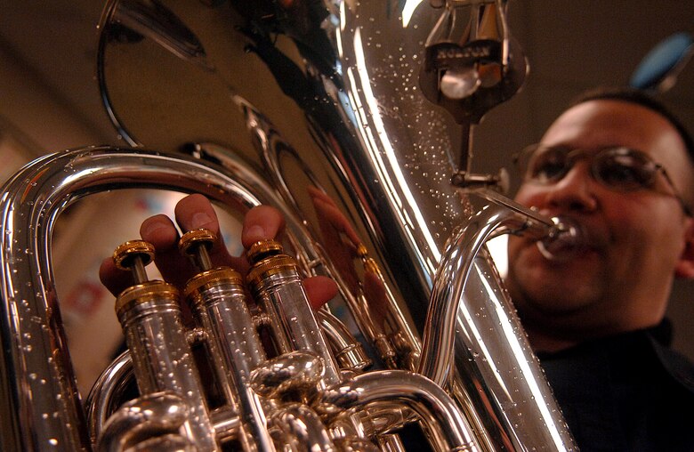 An Air Force musician warms up  to rehearse for the funeral service for President Gerald R. Ford after arriving at Grace Episcopal Church Jan. 1 in Grand Rapids, Mich. (U.S. Air Force photo/Tech. Sgt. Jeremy T. Lock)





